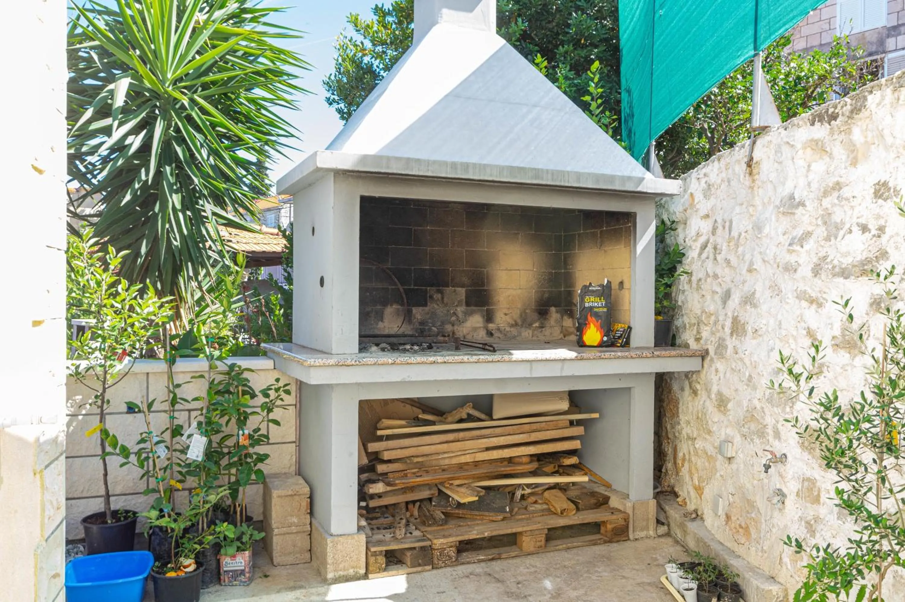 BBQ facilities in Apartments Siri, 1 min walk to the beach