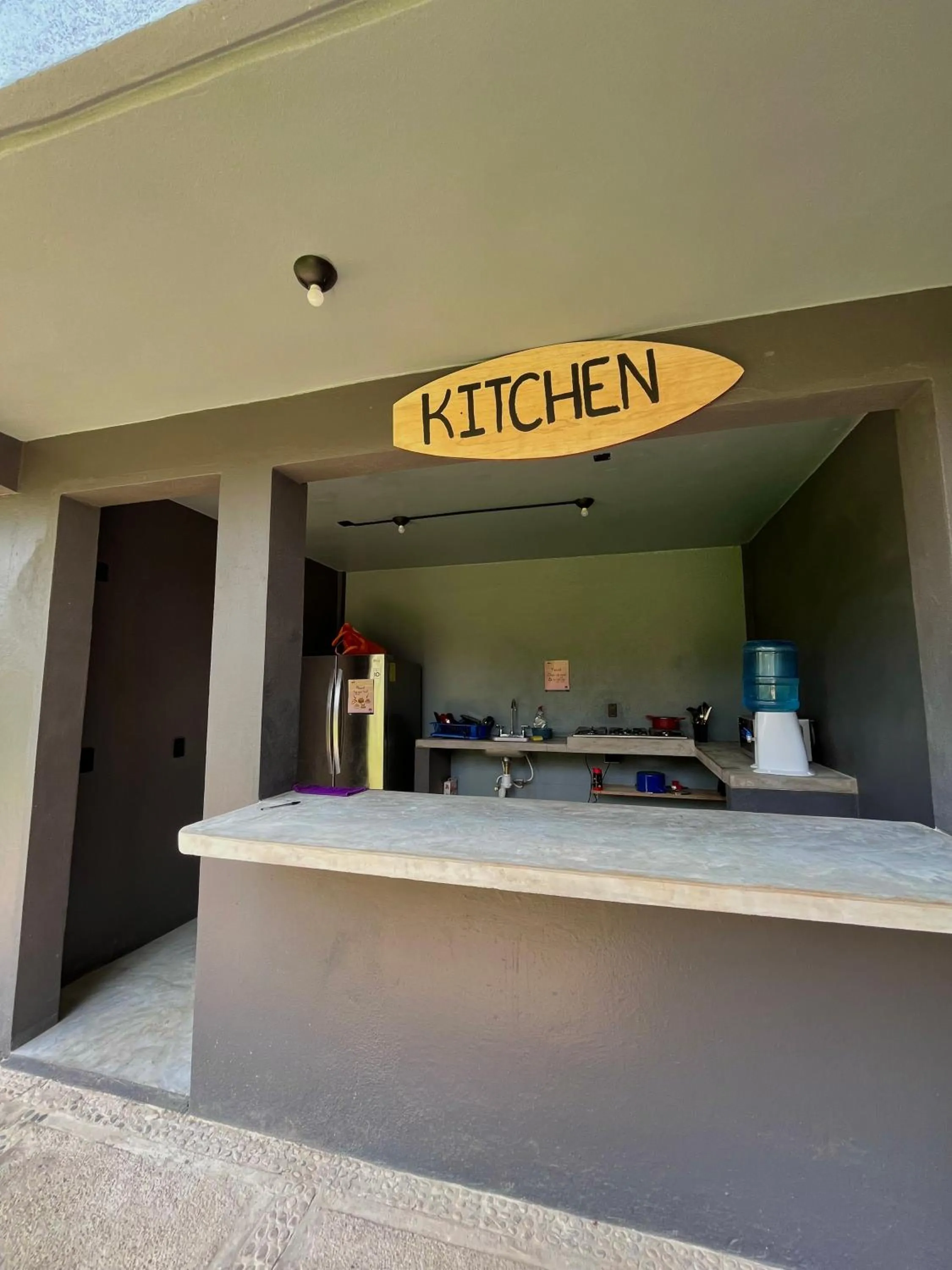 Communal kitchen in Straw Hat Surf Hostel & Bar