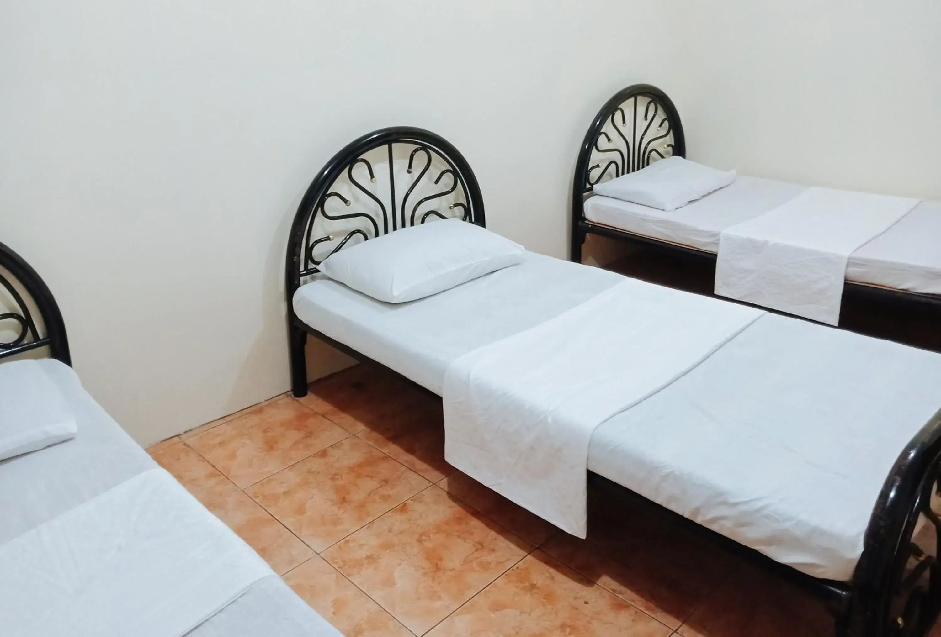 Triple Room in RedDoorz @ Plaza La Paz Iloilo City Triple Room in RedDoorz @ Plaza La Paz Iloilo City