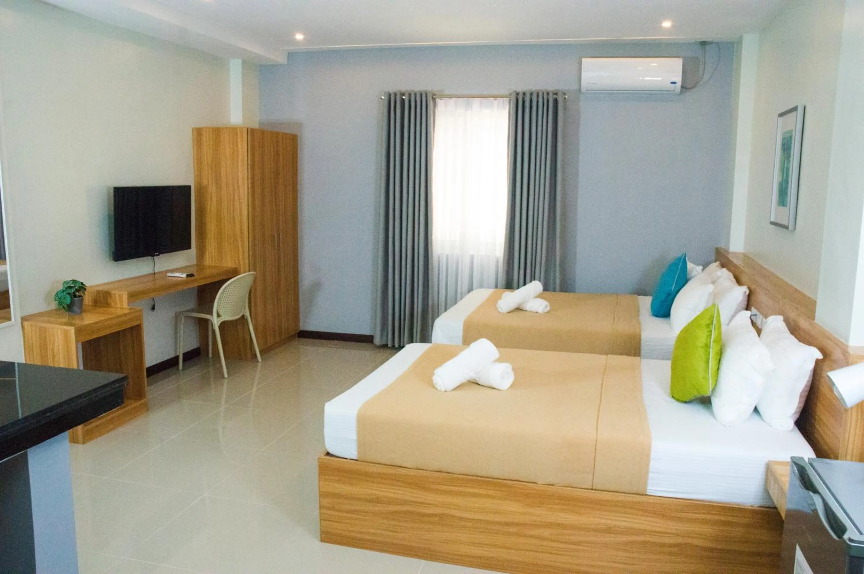 Bedroom in ELTI SUITES By Bluebookers