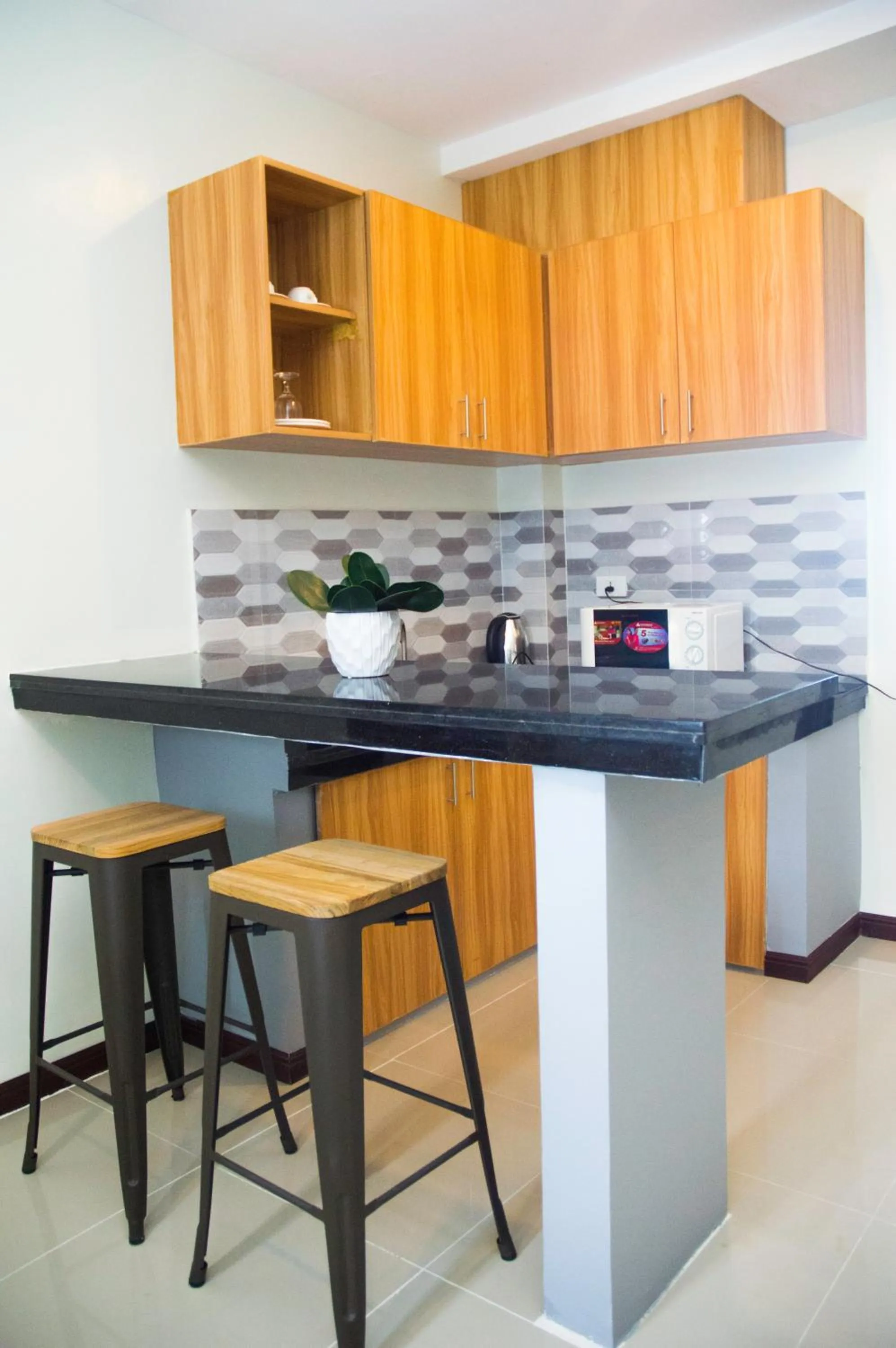 Kitchen or kitchenette in ELTI SUITES By Bluebookers