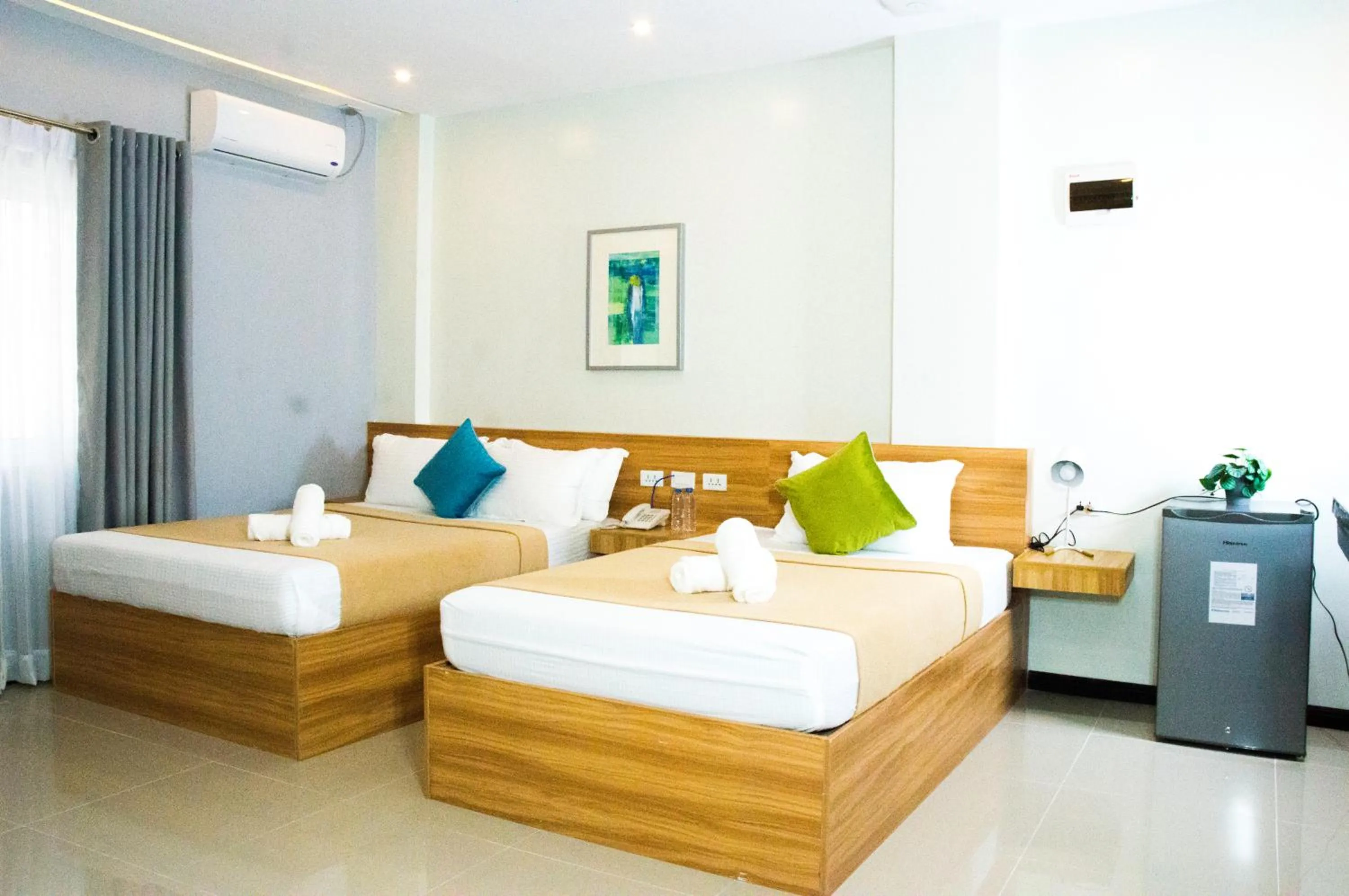 Bed in ELTI SUITES By Bluebookers