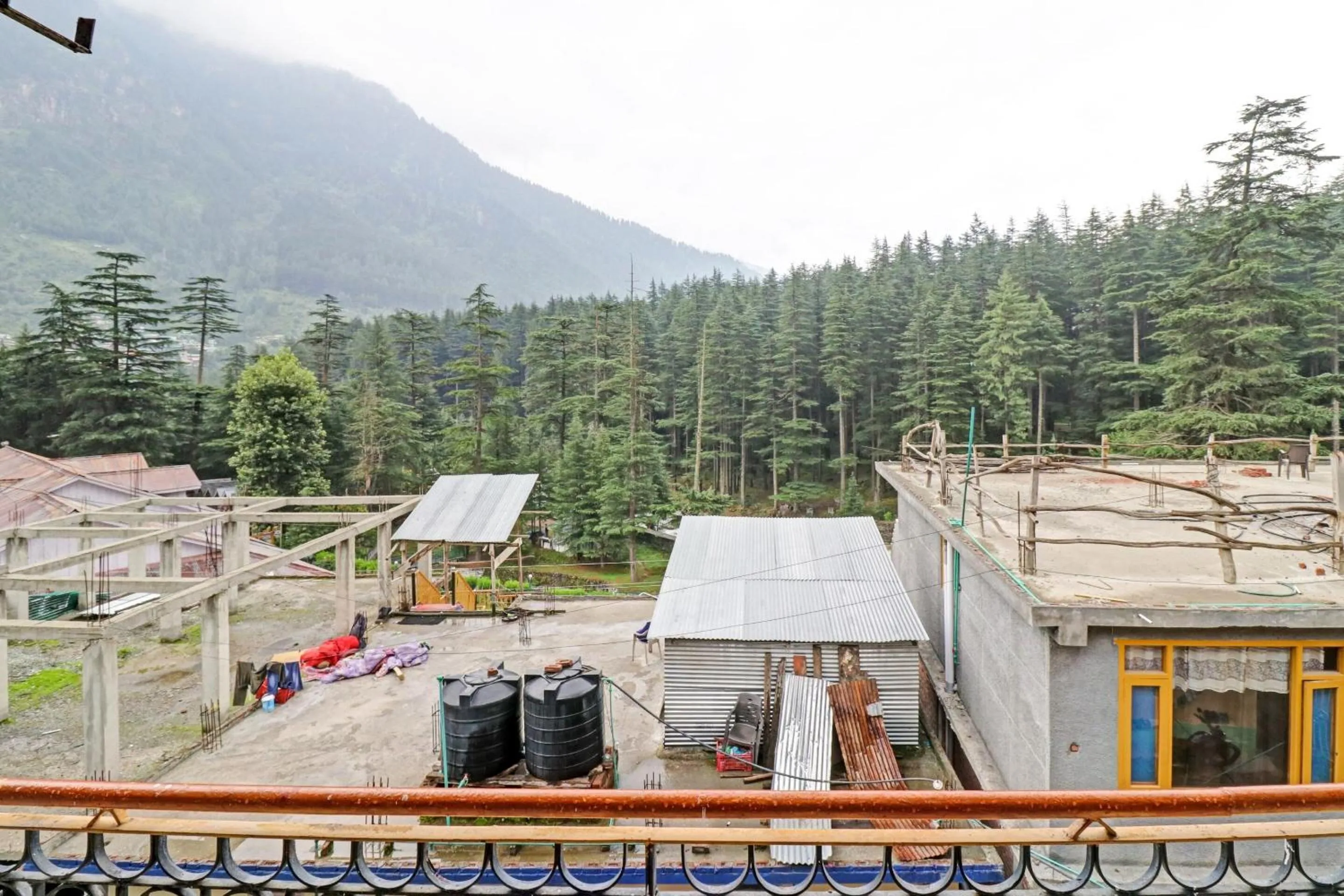 Bedroom in Hotel O Hema Holiday Home