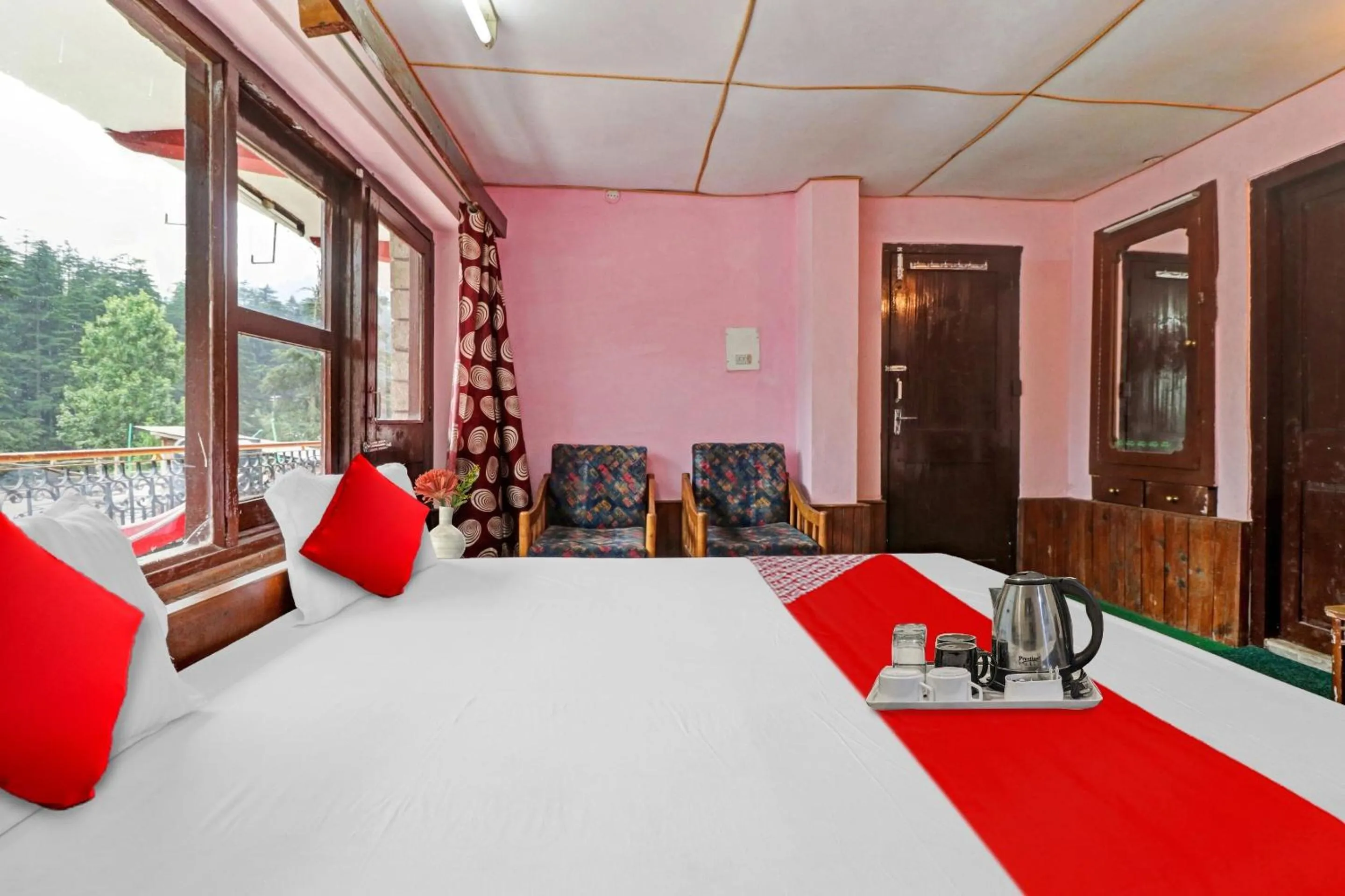 Bedroom in Hotel O Hema Holiday Home