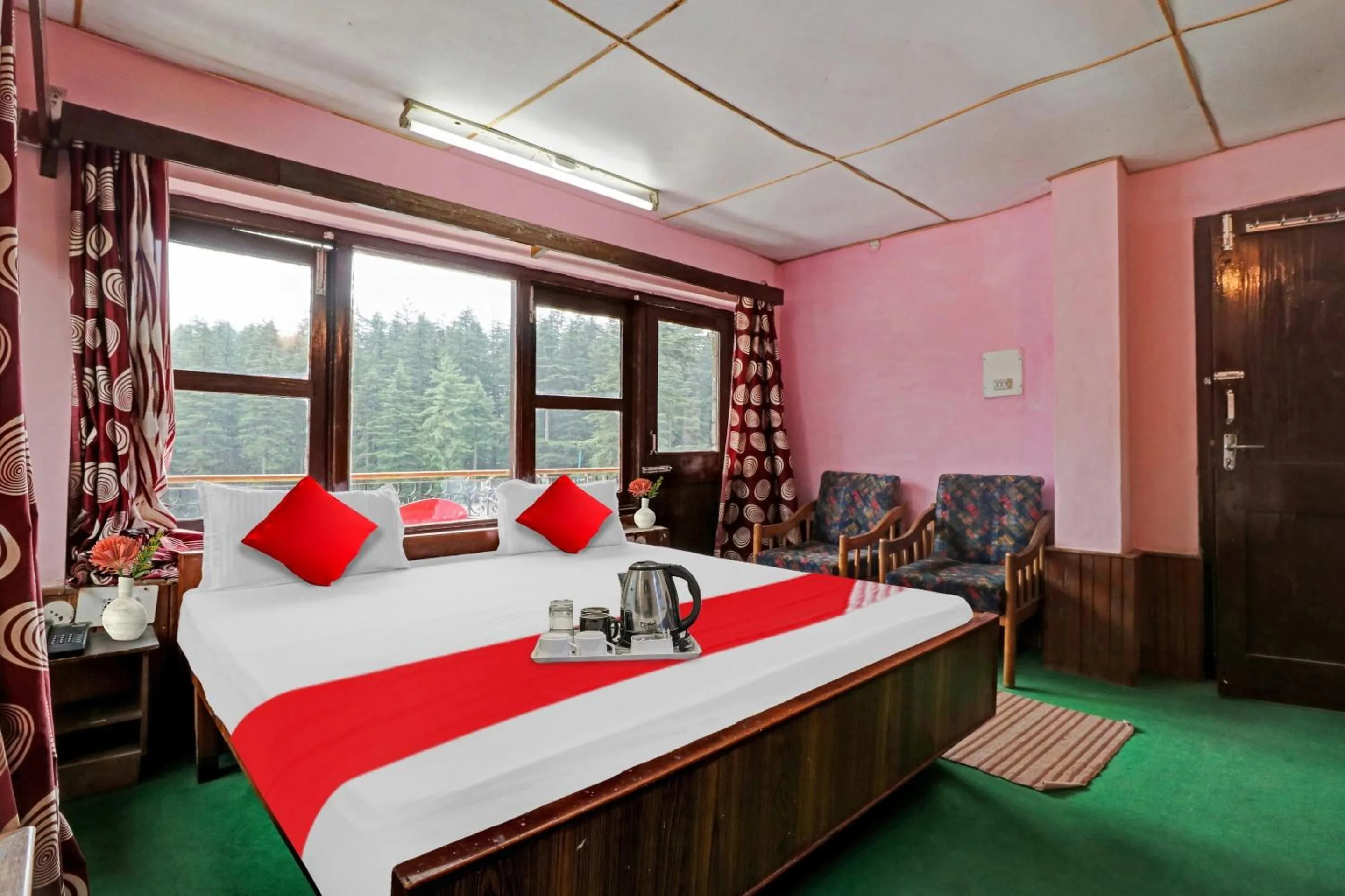 Bedroom, Bed in Hotel O Hema Holiday Home