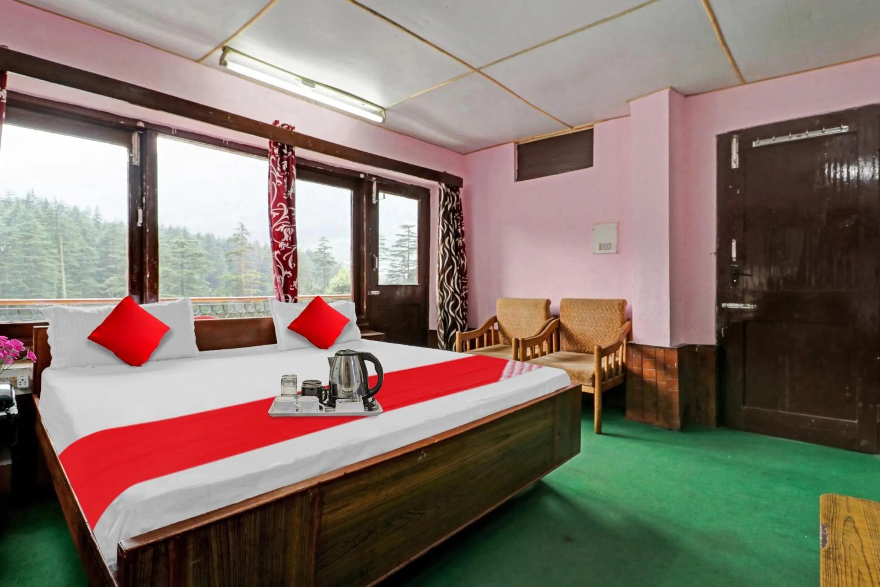 Bedroom, Bed in Hotel O Hema Holiday Home