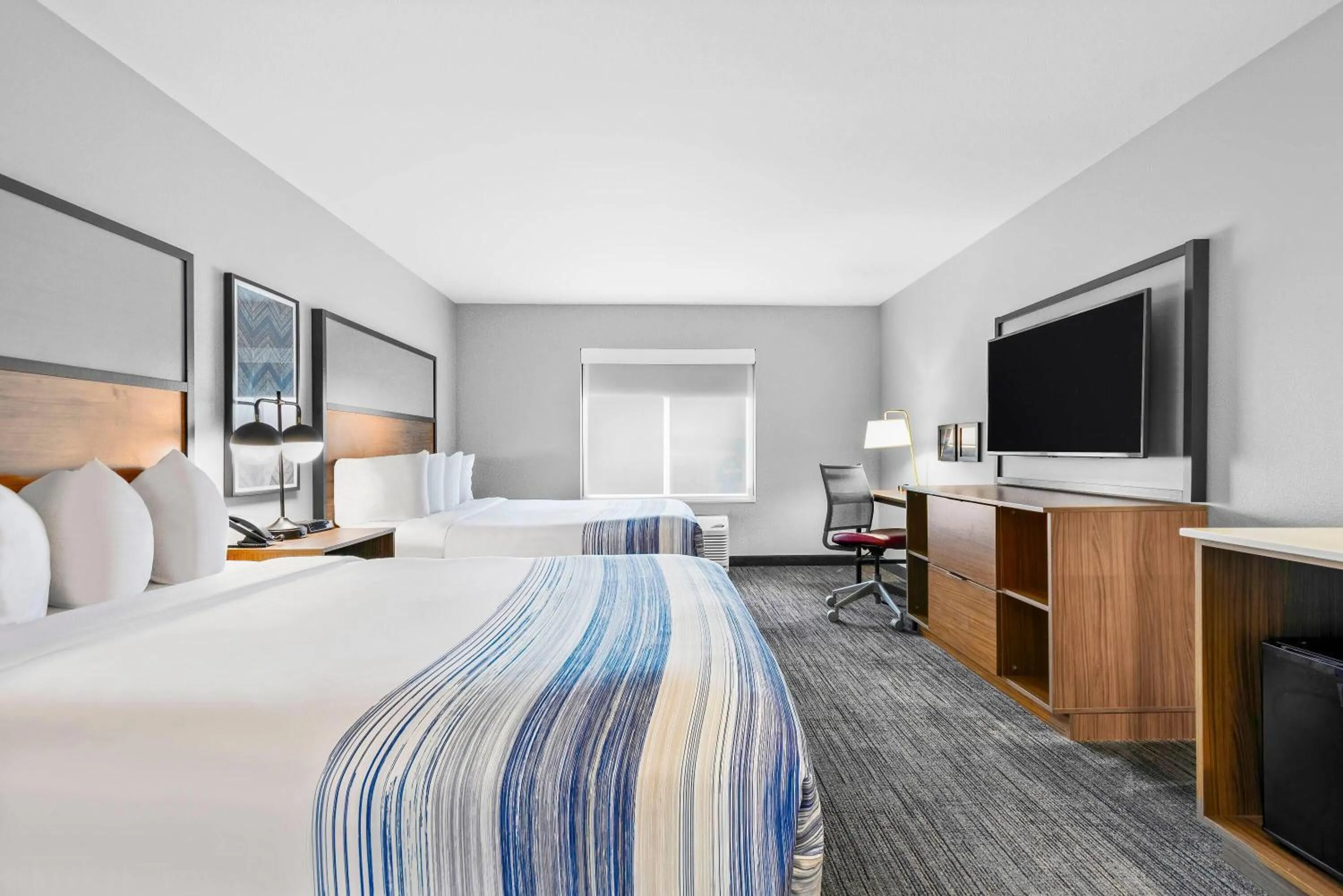 Photo of the whole room, Bed in AmericInn by Wyndham International Falls
