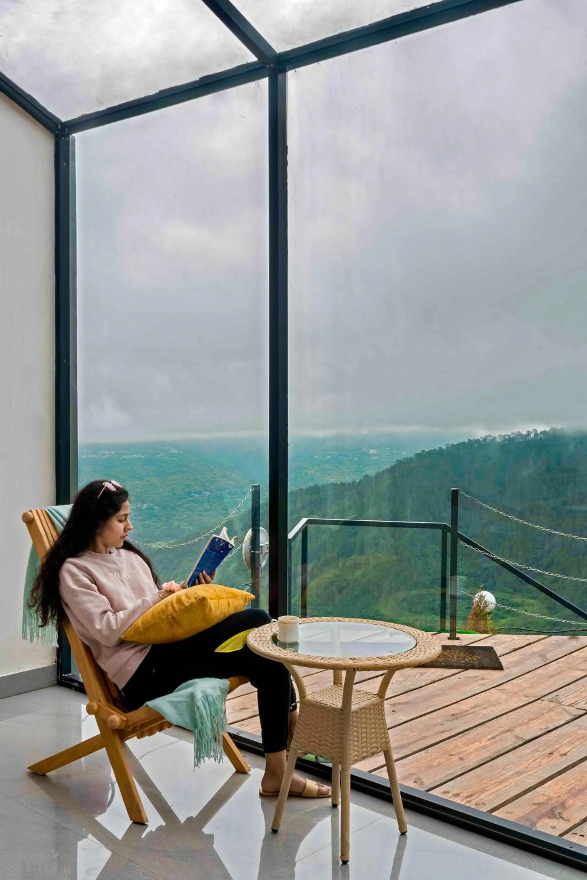 People in SaffronStays Glasshouse Celeste, Ranikhet - luxurious glass villa with breathtaking views