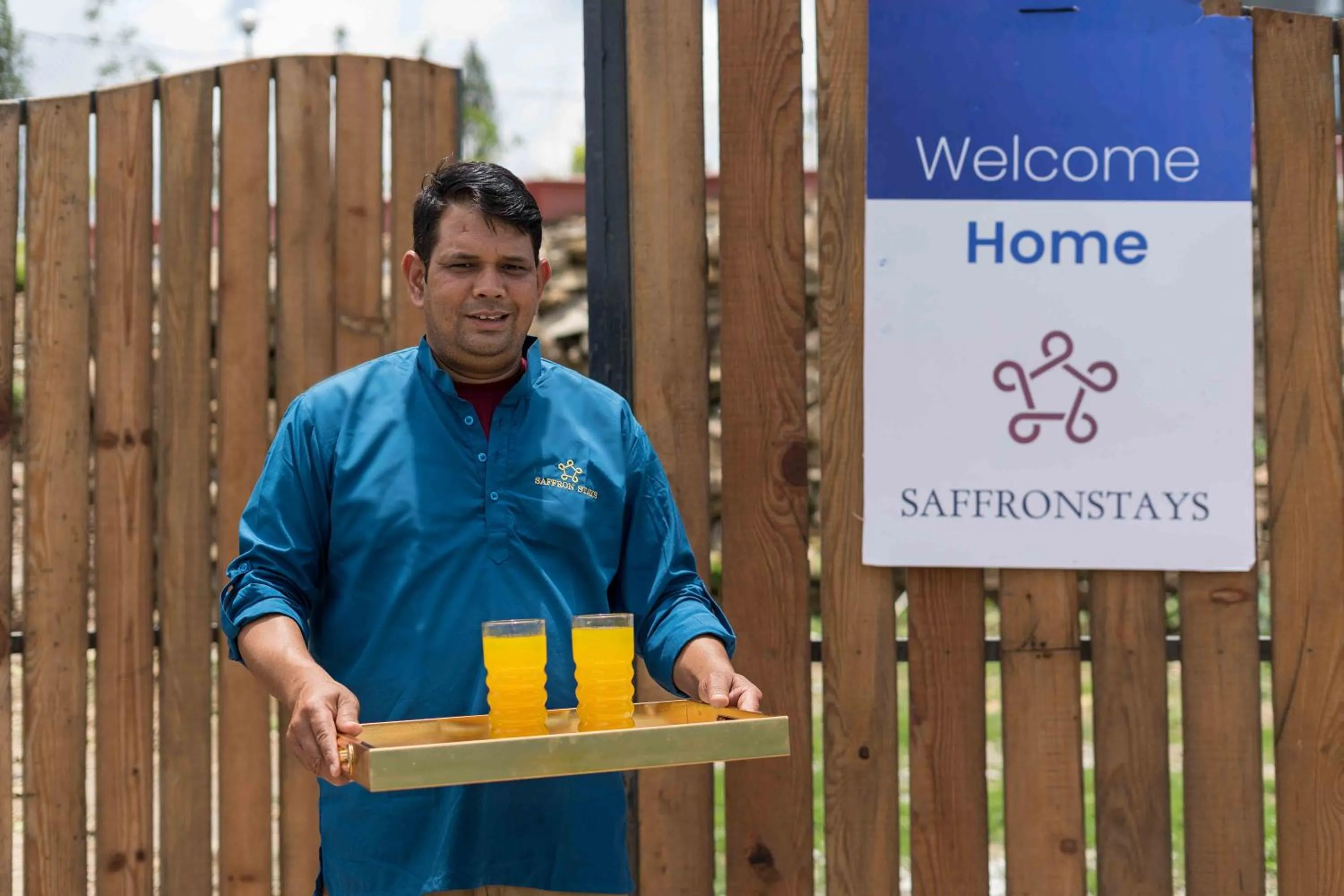 Staff in SaffronStays Glasshouse Celeste, Ranikhet - luxurious glass villa with breathtaking views