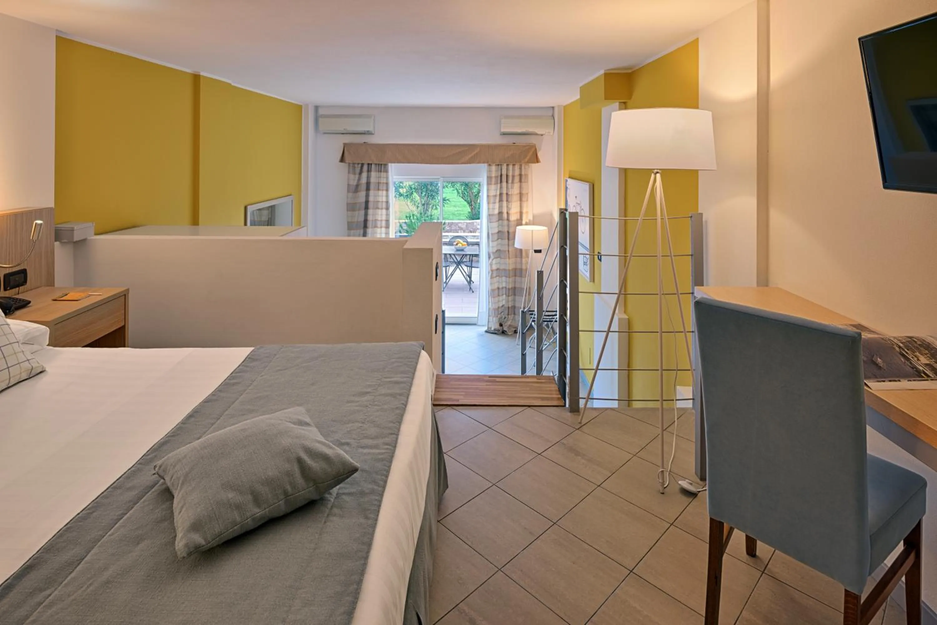 Photo of the whole room, Bed in Aregai Marina Hotel & Residence