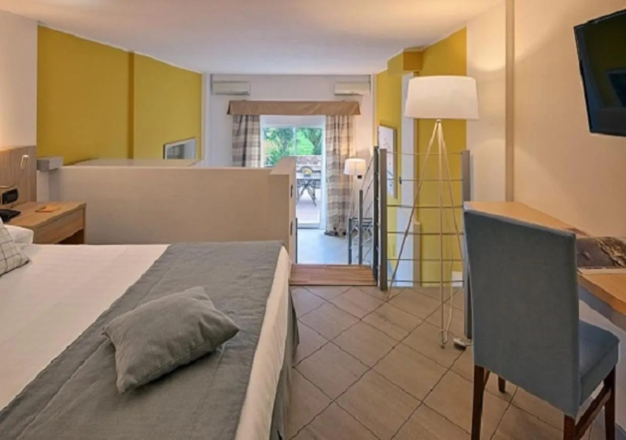 Bed in Aregai Marina Hotel & Residence