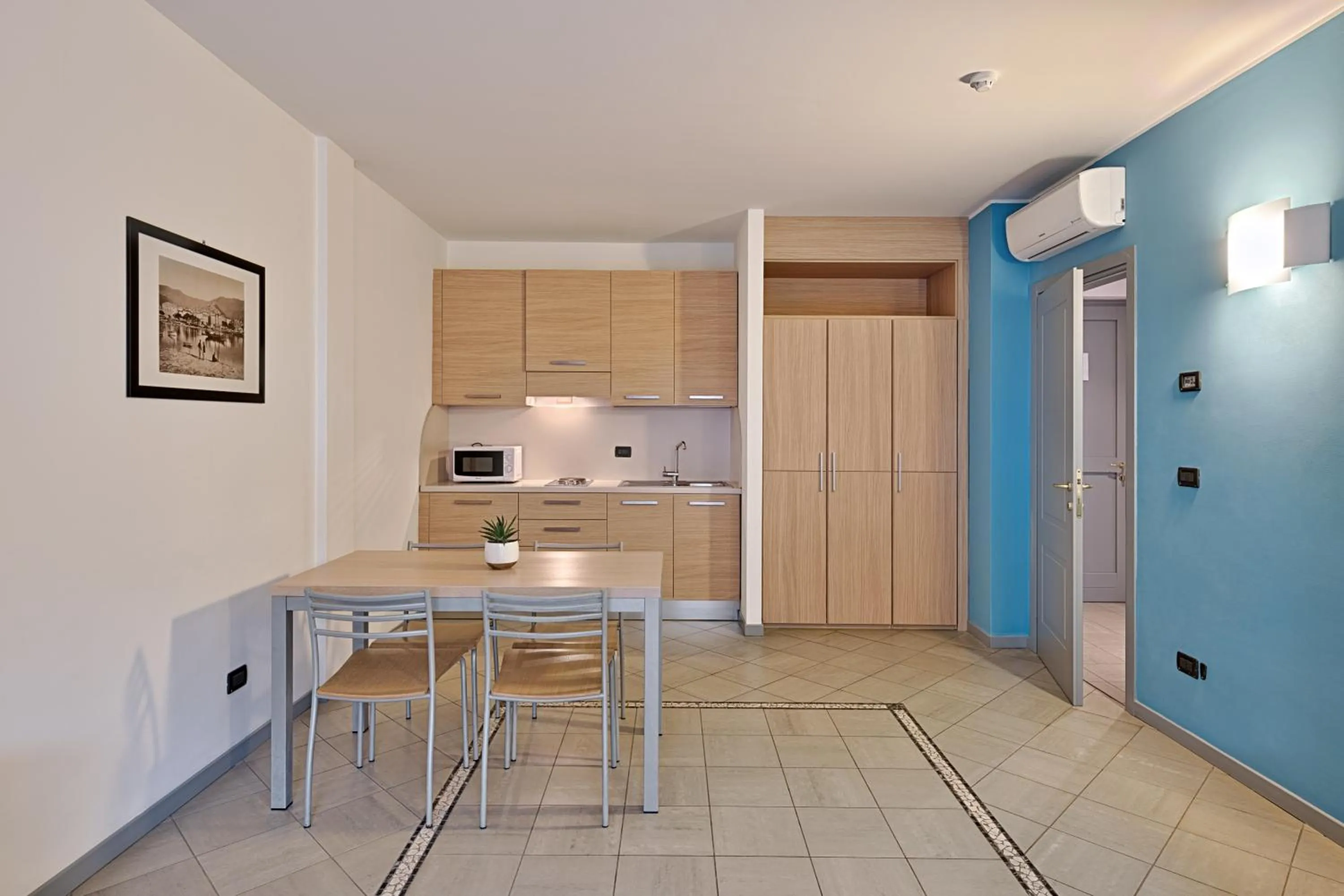 Kitchen or kitchenette in Aregai Marina Hotel & Residence