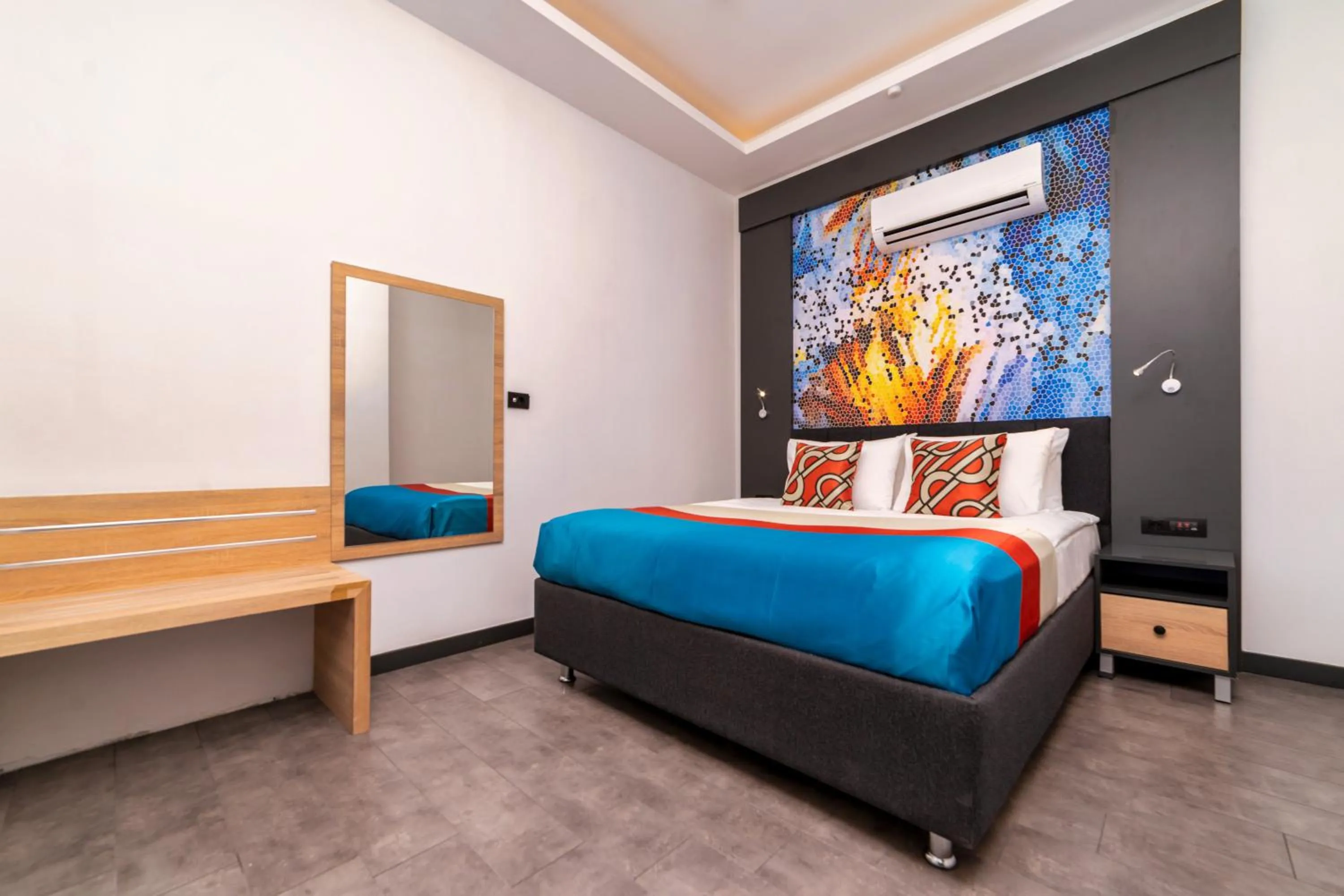 Bed in Optimum Luxury Hotel&Spa