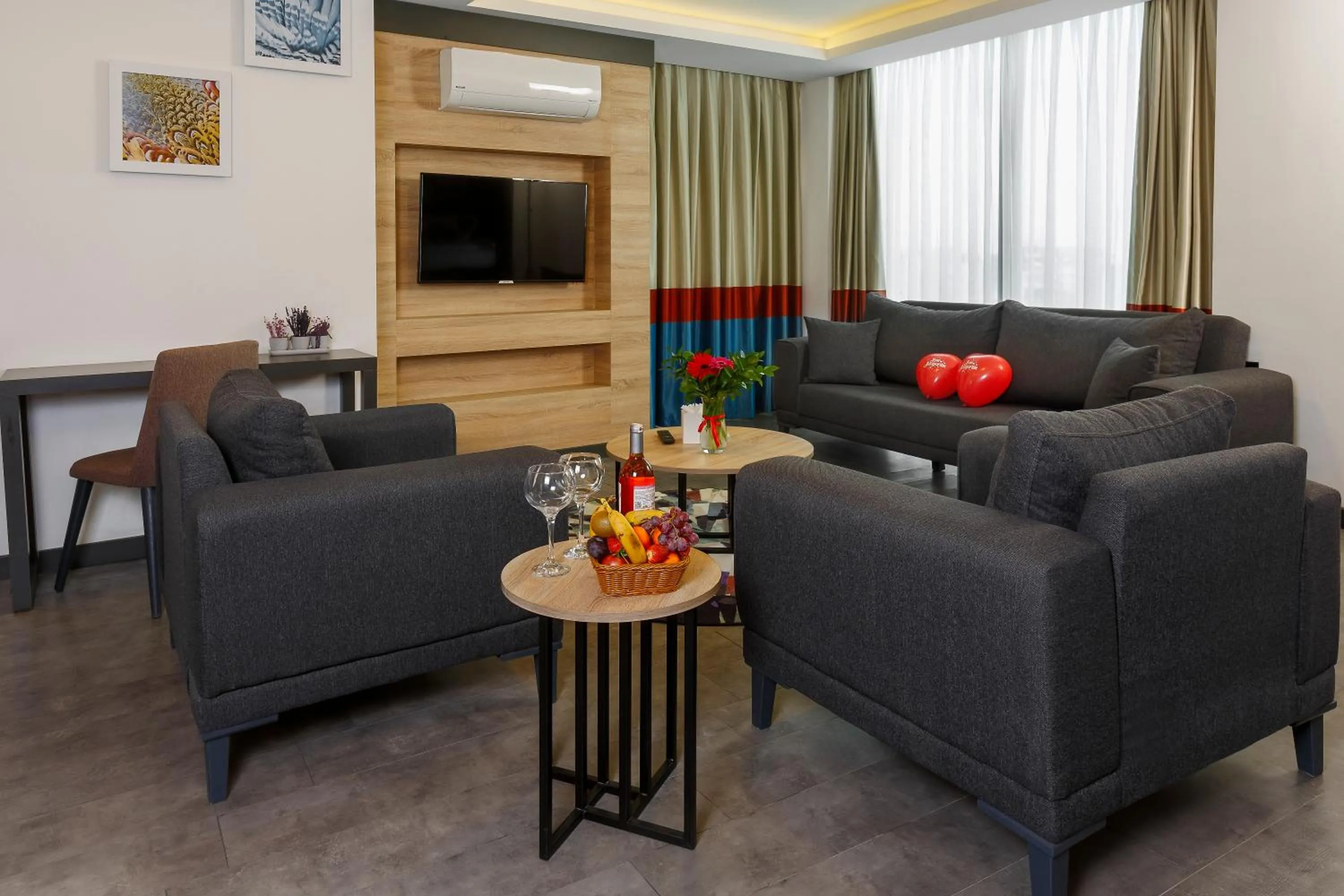 Communal lounge/ TV room in Optimum Luxury Hotel&Spa