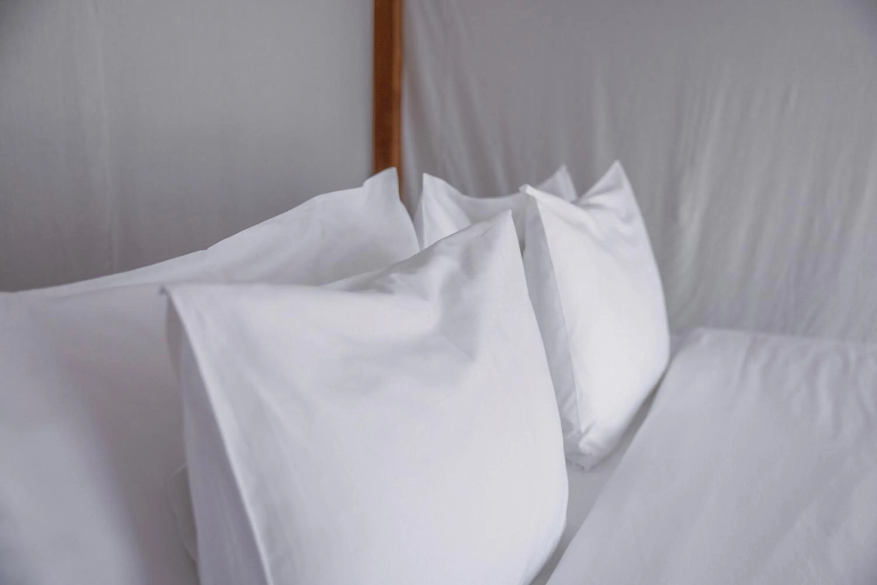 Bed in KA BRU 1100 Boutique Hotel