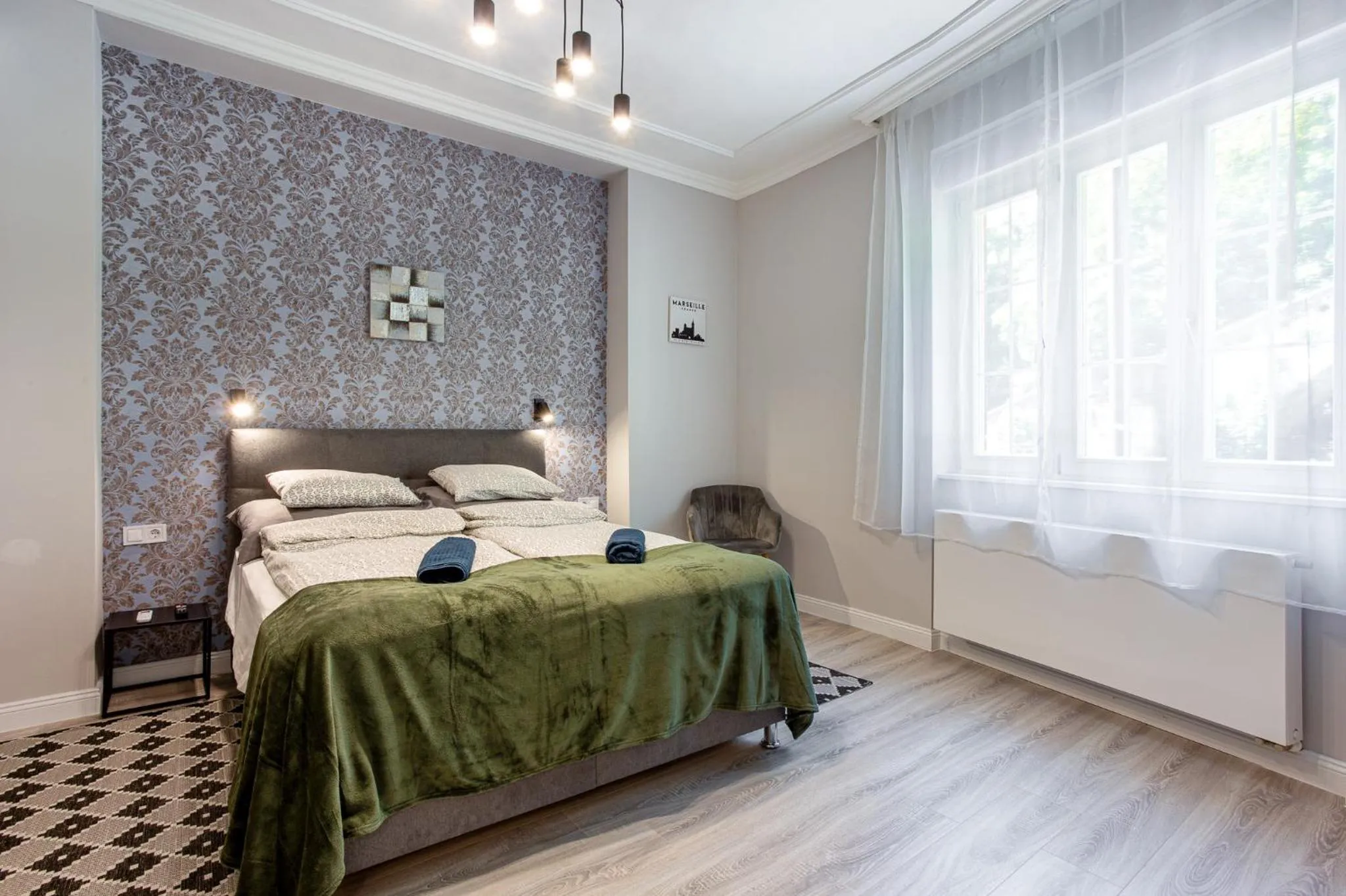 Bed in Buda Castle Serpentine Apartments