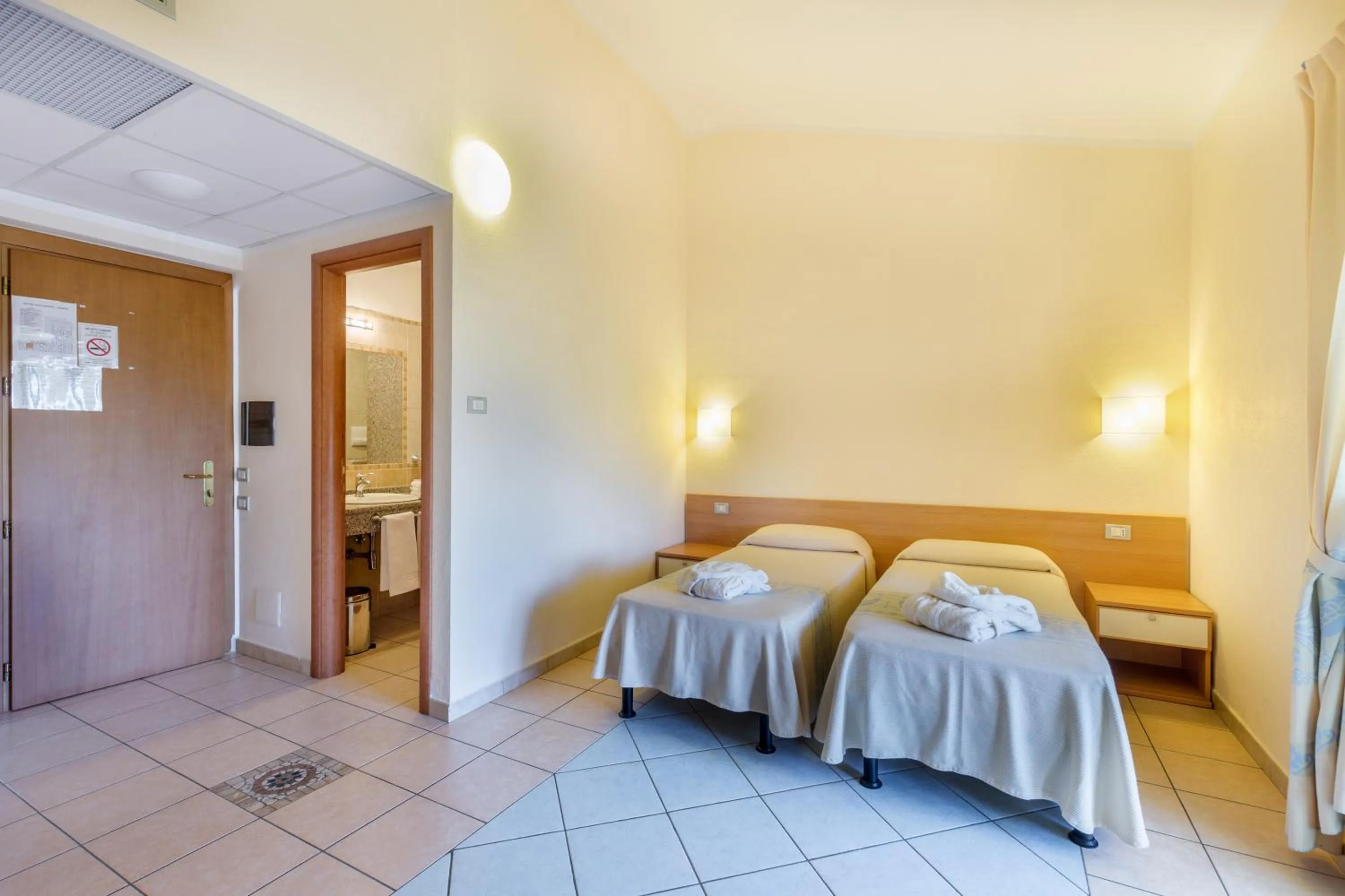 Photo of the whole room, Bed in Hotel Baia Marina