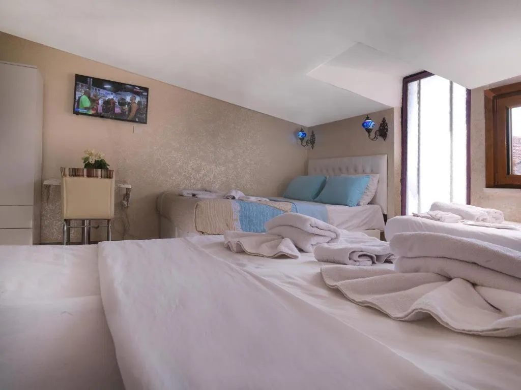 Bed in DİYAR BUDGET HOTEL