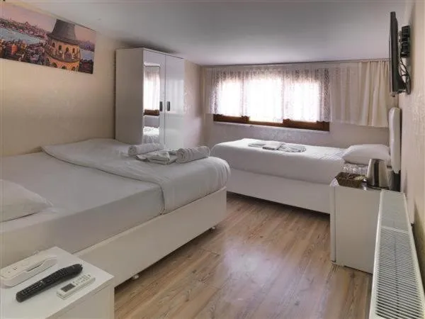 Bed in DİYAR BUDGET HOTEL