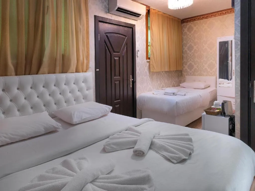 Photo of the whole room, Bed in DİYAR BUDGET HOTEL