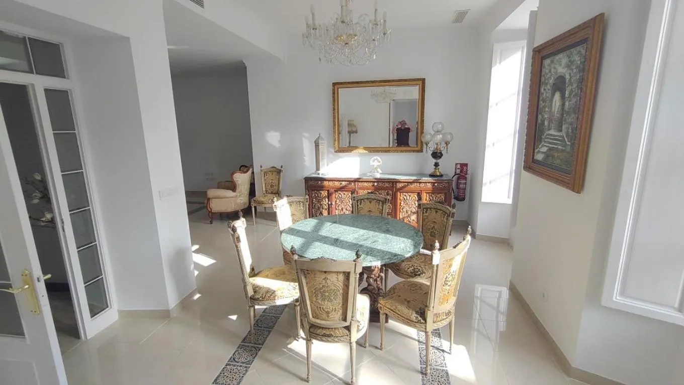 Communal lounge/ TV room in El Palacete de Cuevas