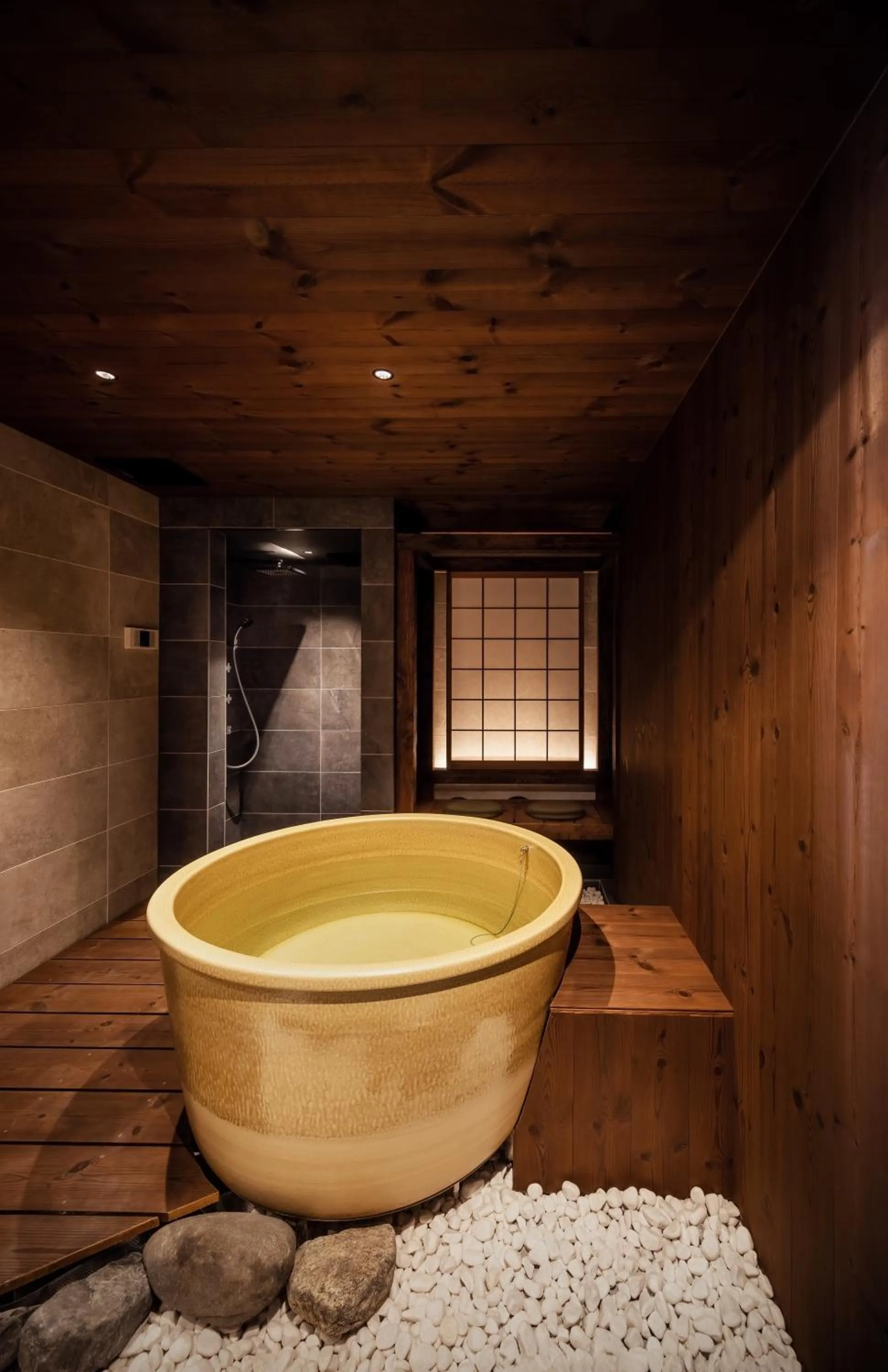 Hot Tub in 古今 天下茶屋 with a private parking lot and a half open-air bath and direct to KIX