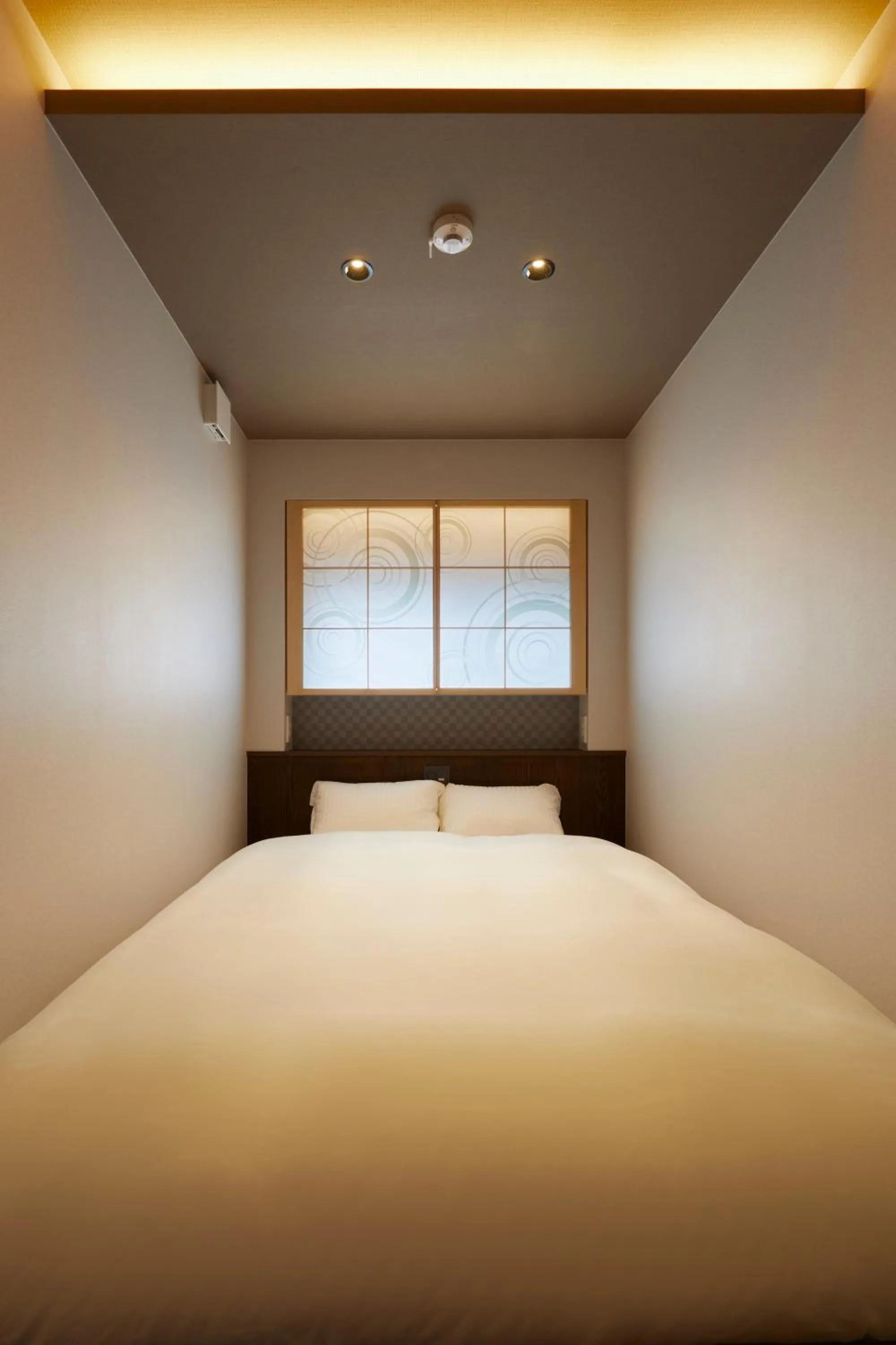 Bedroom, Bed in 古今 天下茶屋 with a private parking lot and a half open-air bath and direct to KIX