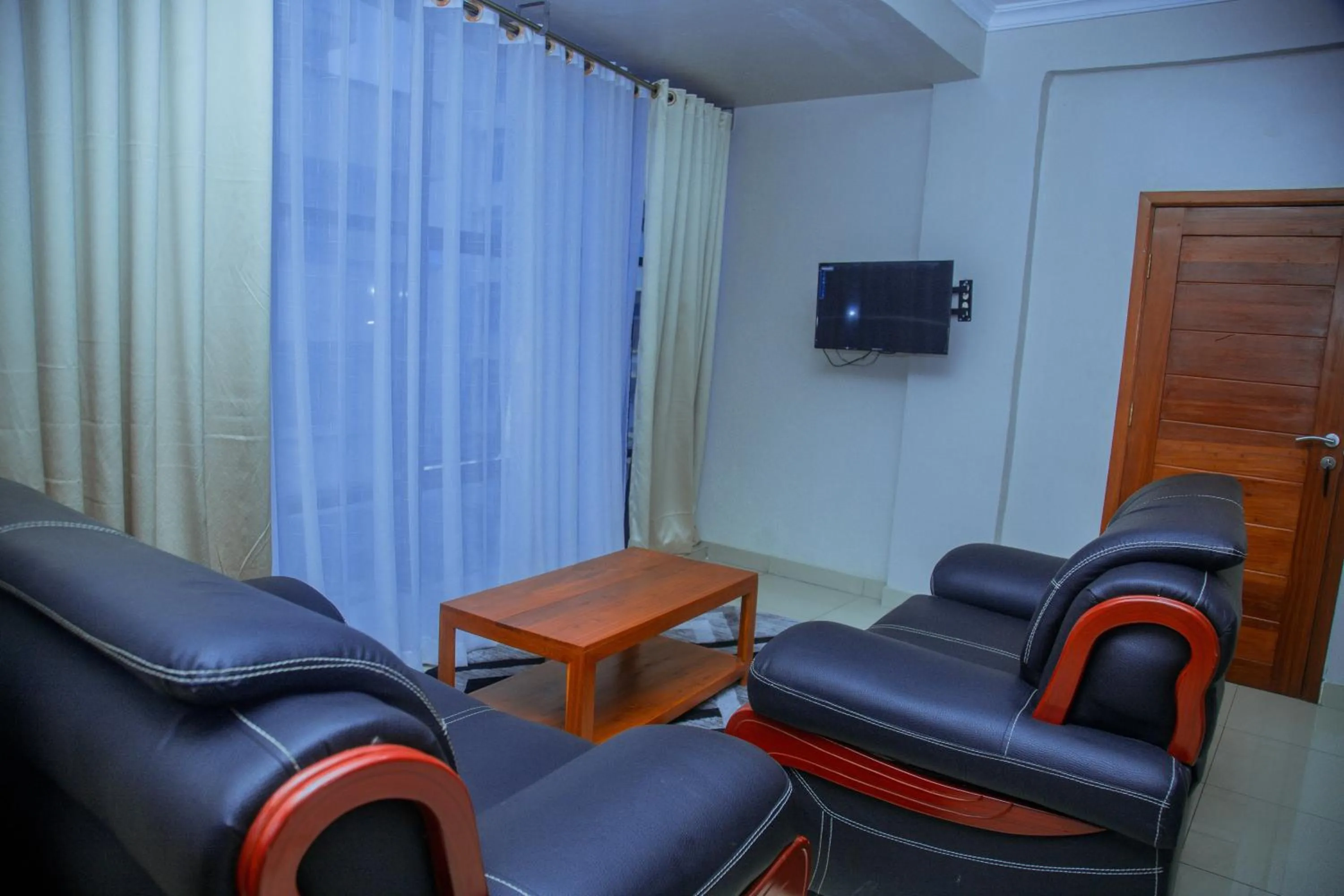 Communal lounge/ TV room in LE GRAND MARIE HOTEL