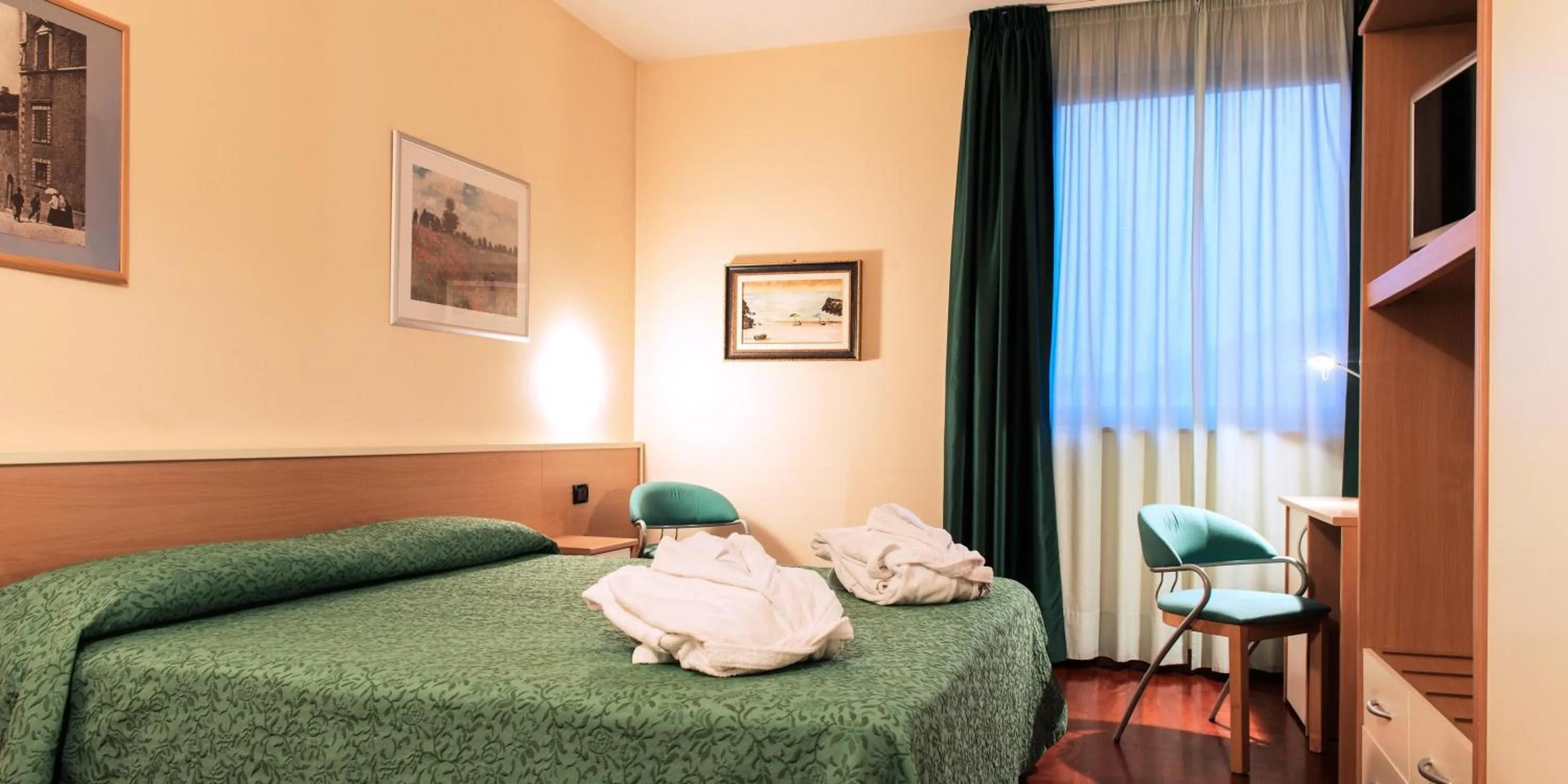 Bed in Hotel Torresi