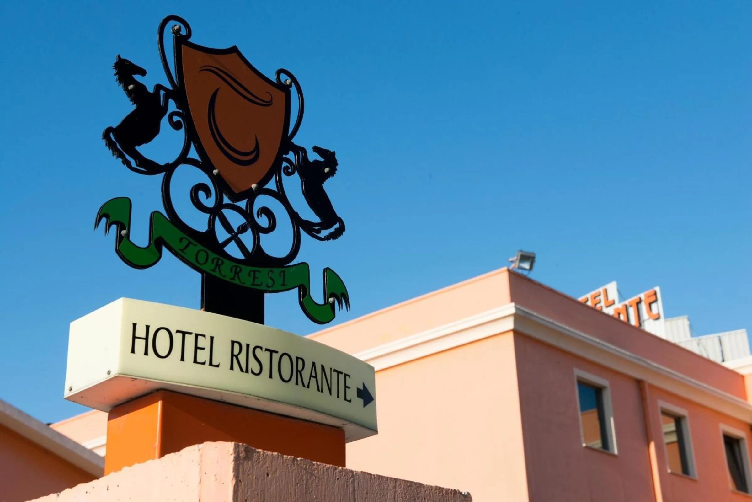 Property logo or sign in Hotel Torresi