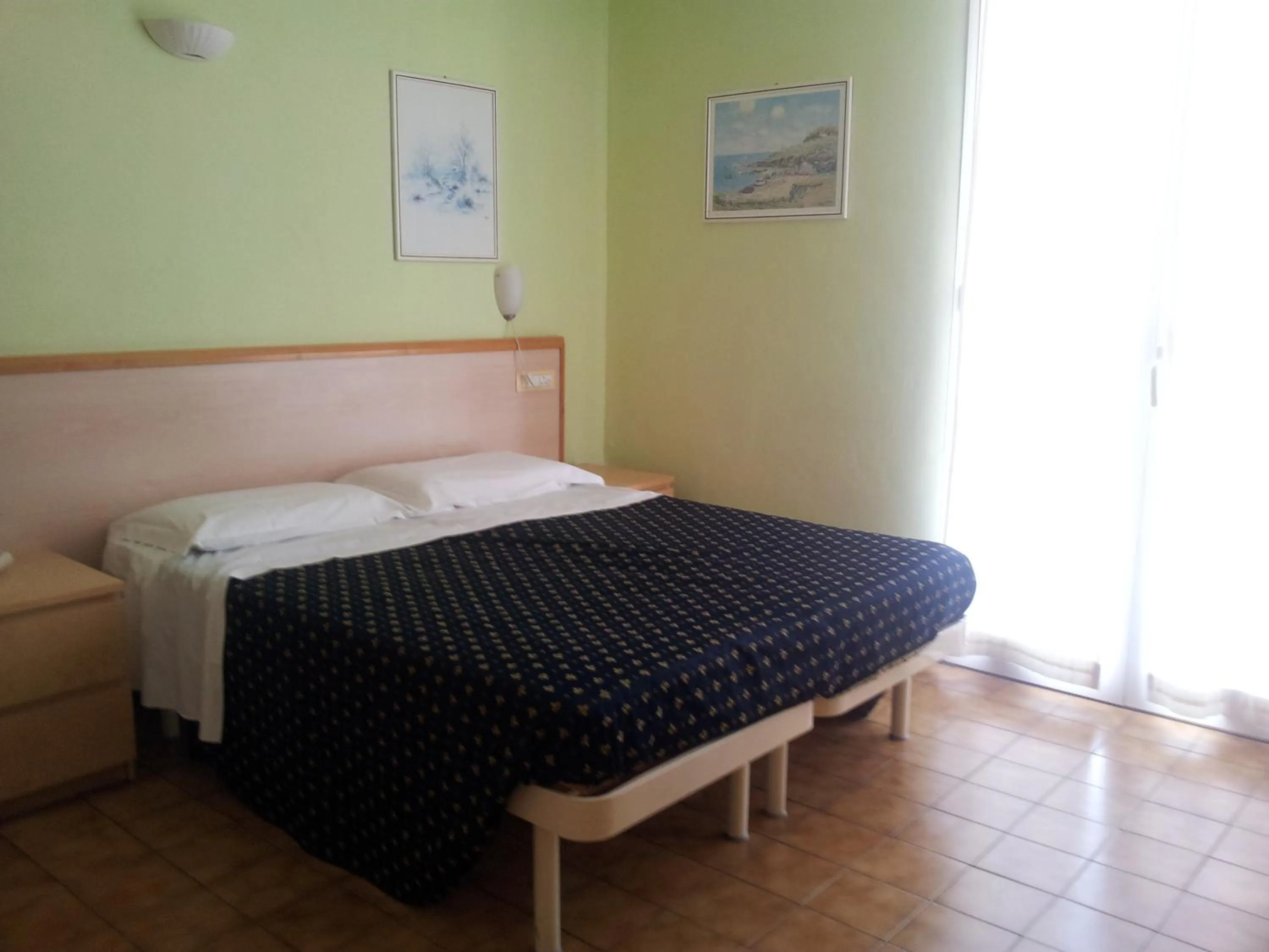 Bed in Hotel Delle Mimose