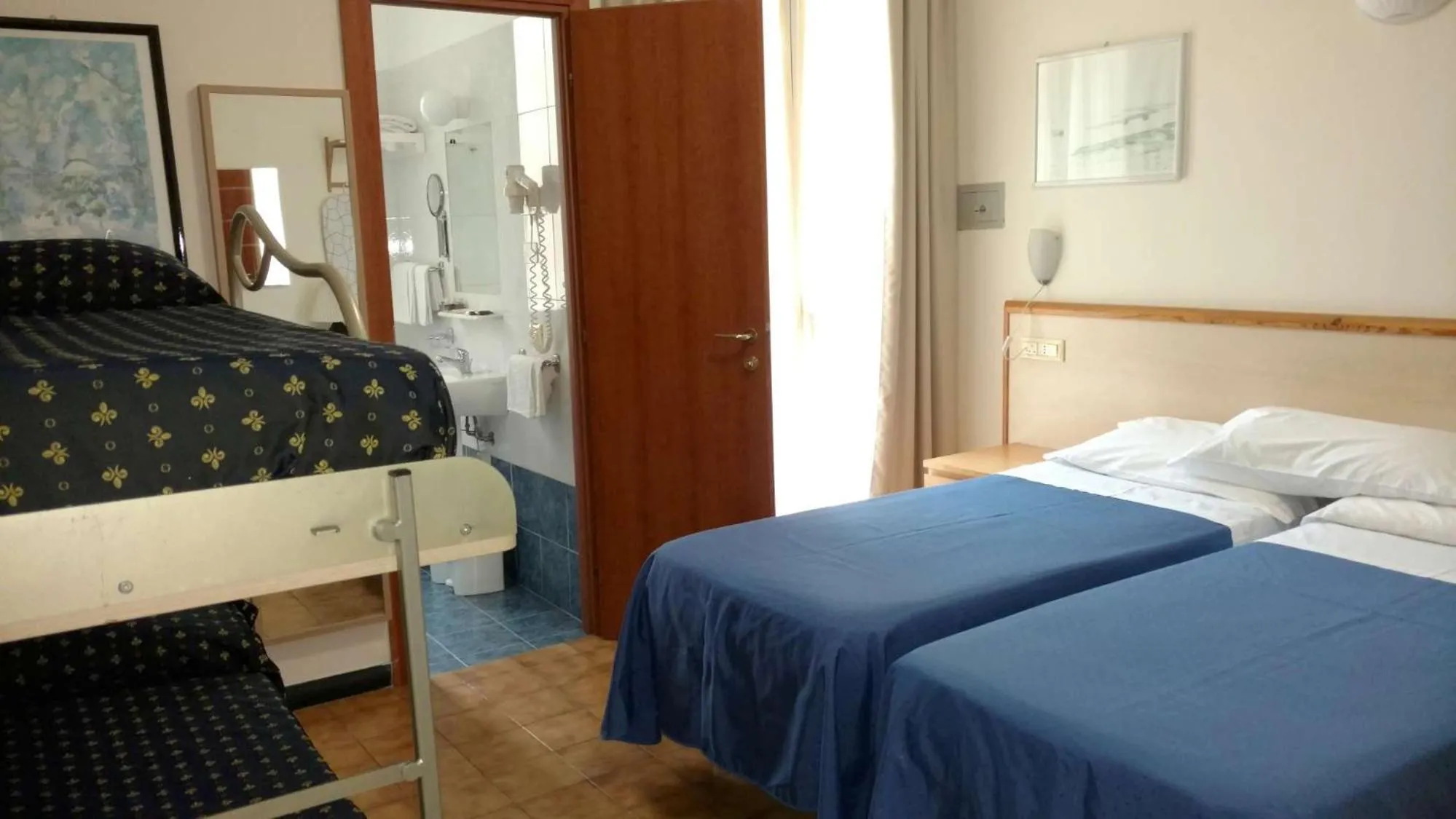 Bed in Hotel Delle Mimose