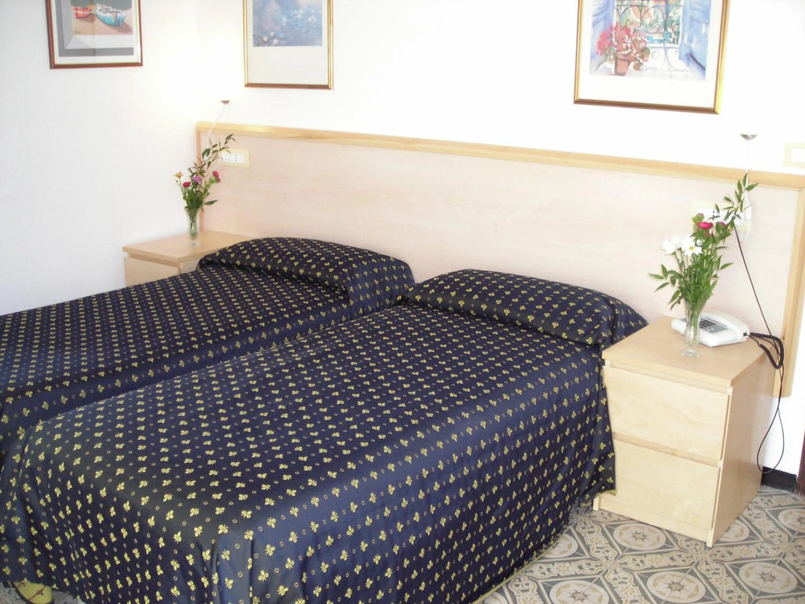 Bed in Hotel Delle Mimose