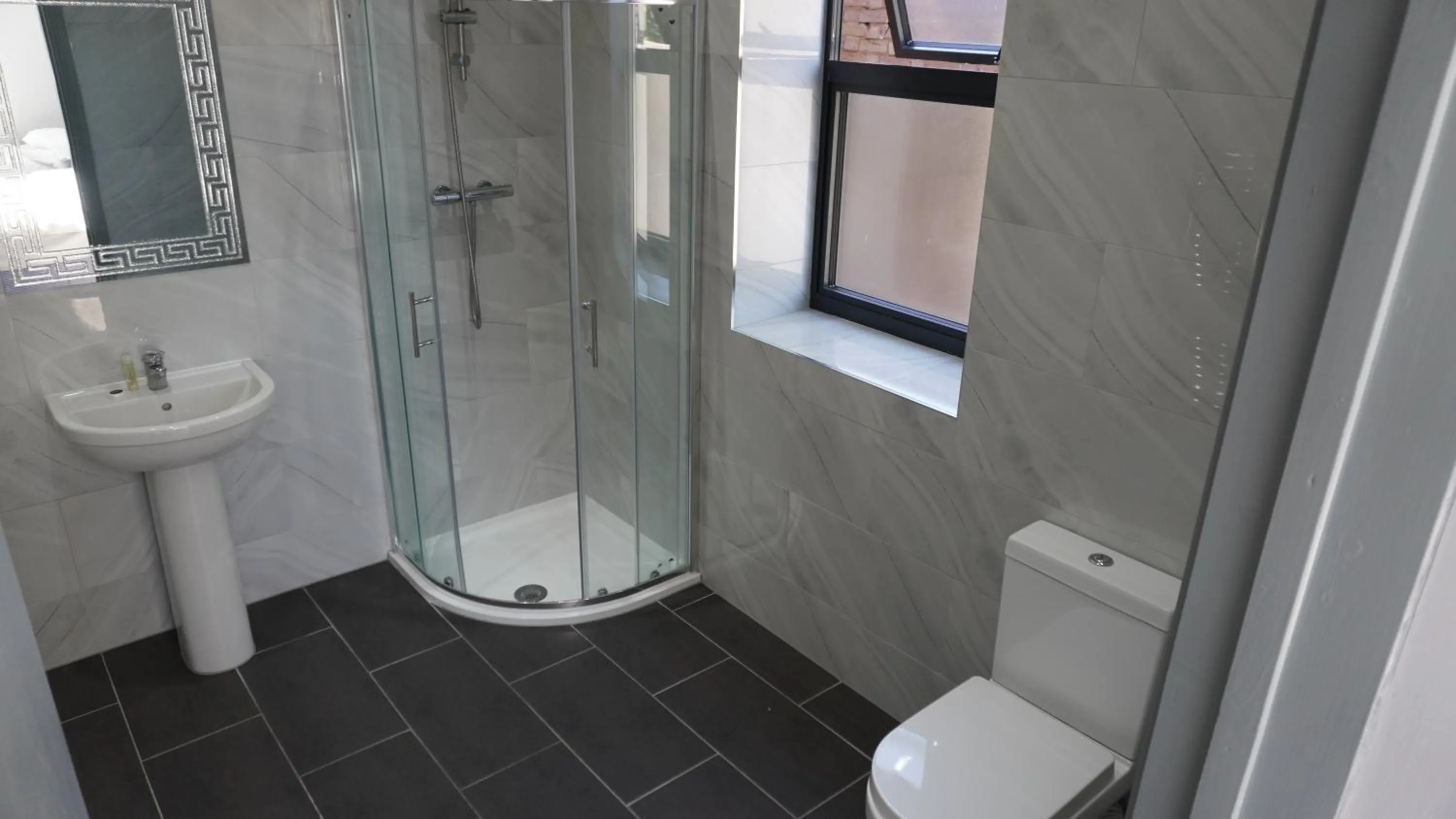 Bathroom in Roshni Hotel