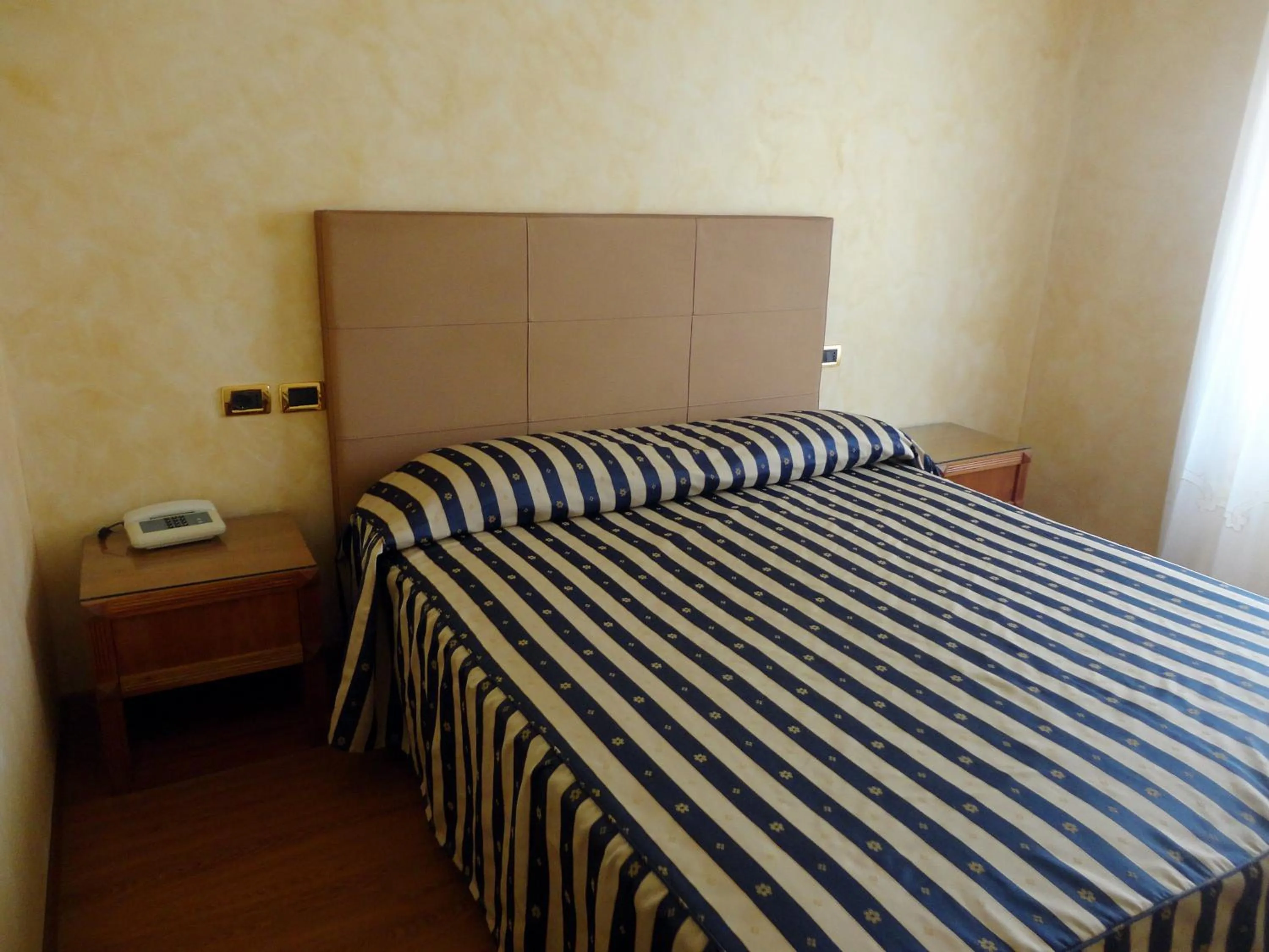 Bedroom in Hotel De Paris