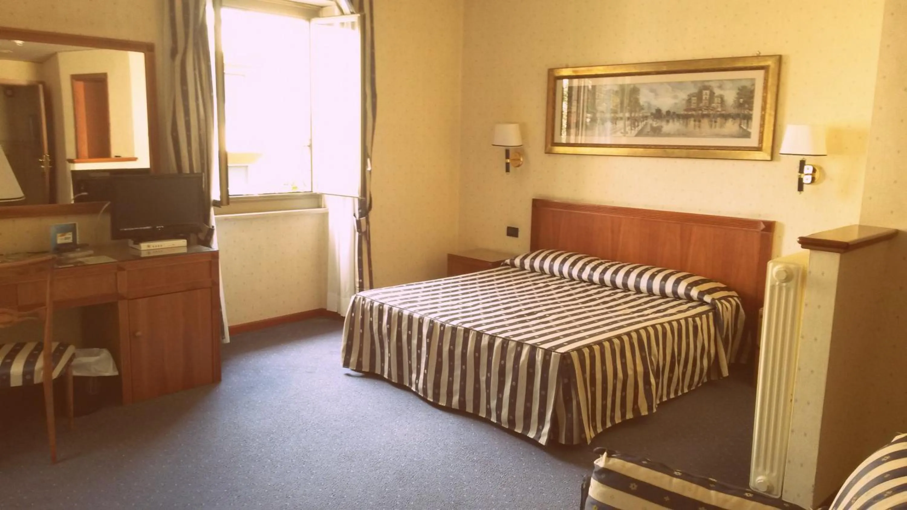 Bedroom in Hotel De Paris