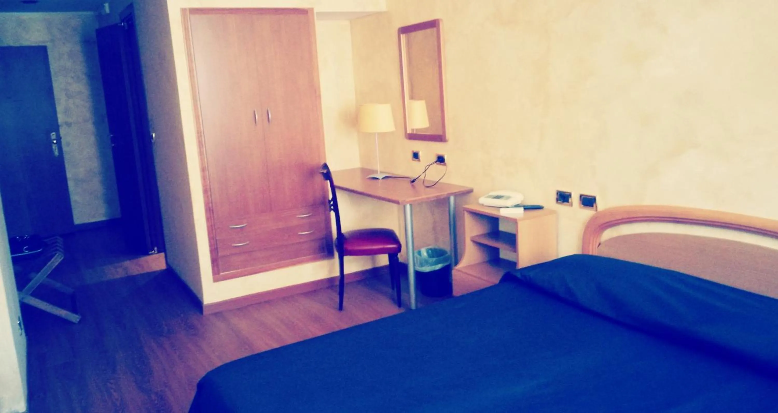 Bedroom in Hotel De Paris