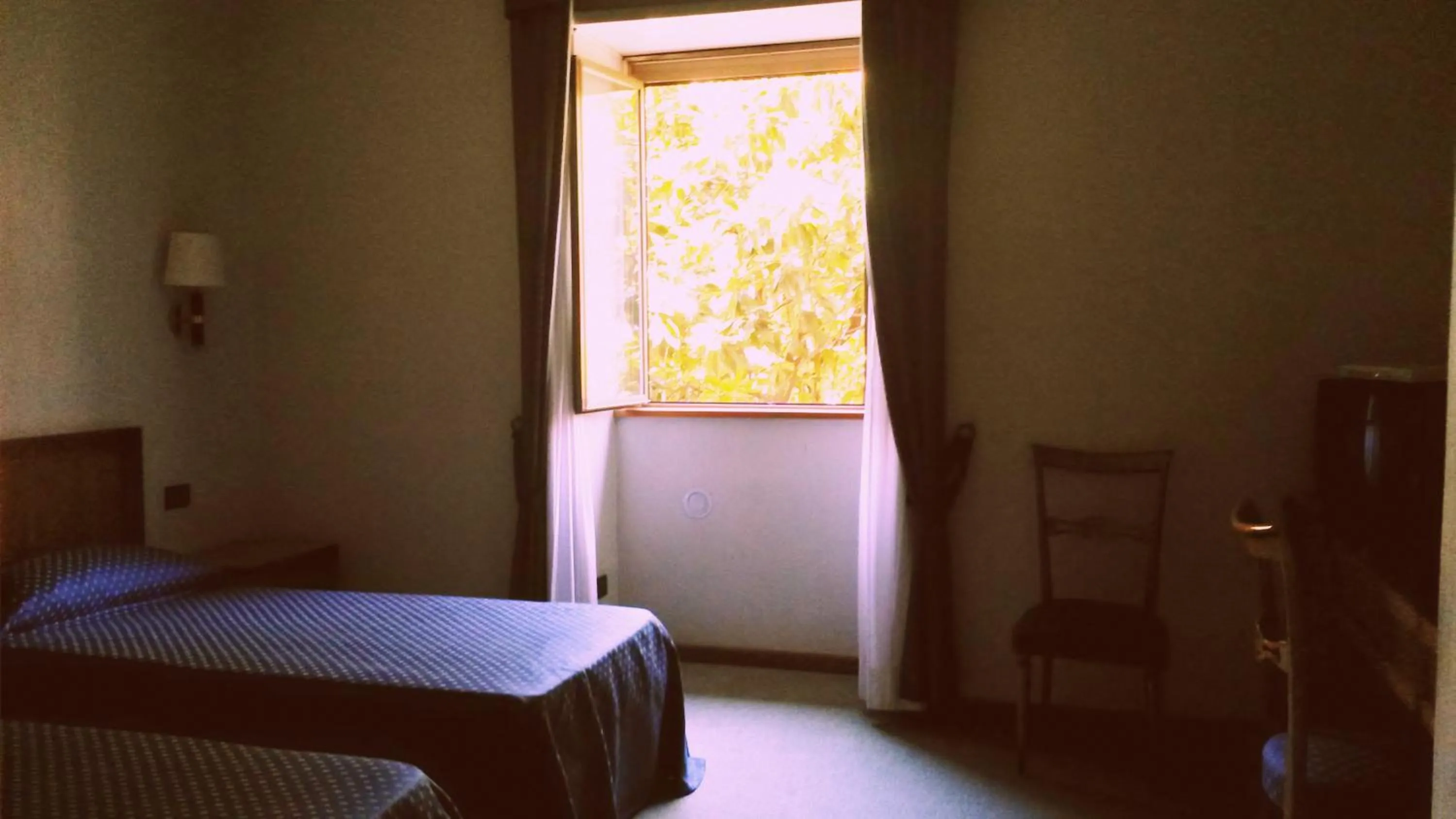 Bedroom in Hotel De Paris