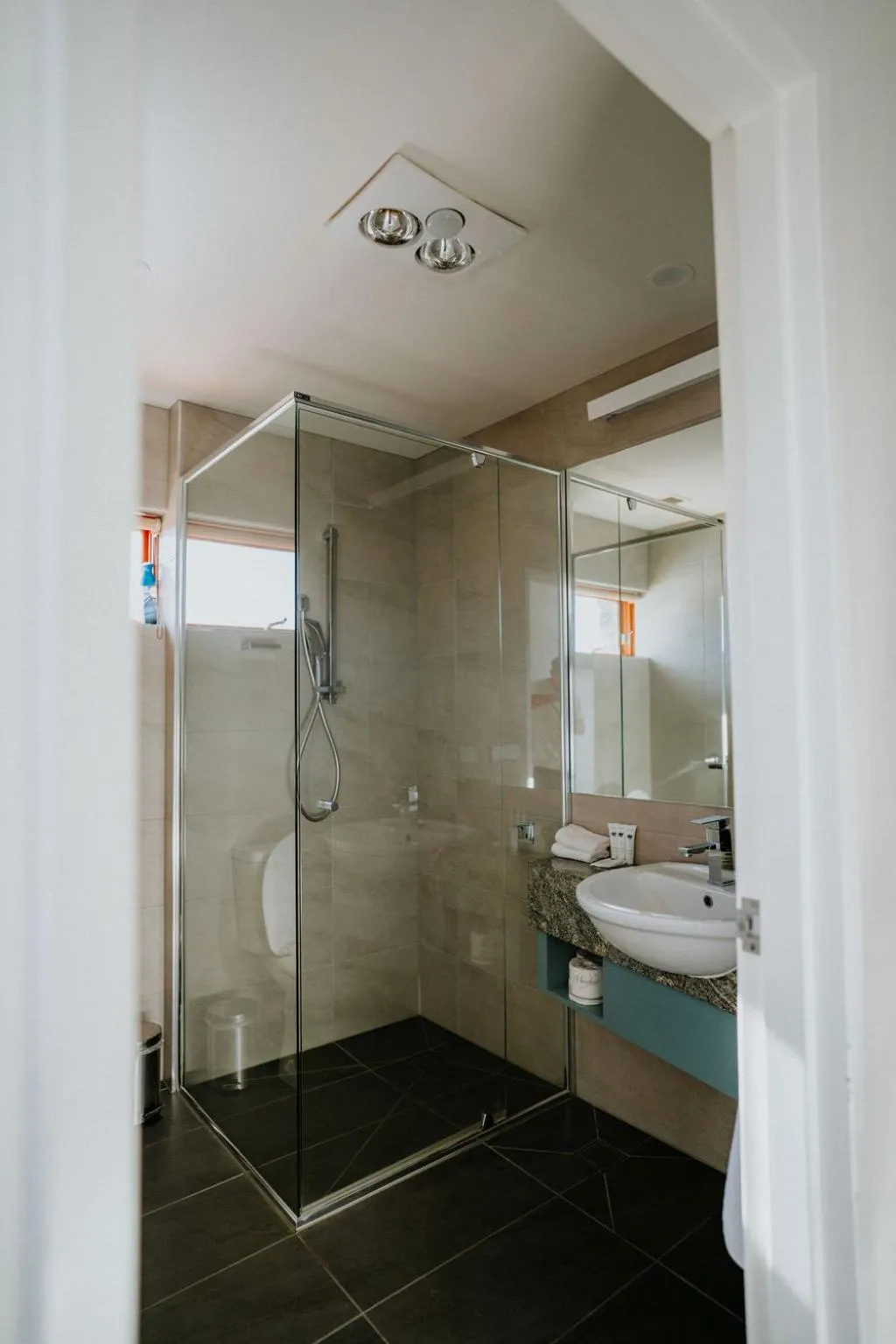 Shower in Alpine Woodsmoke Apartments