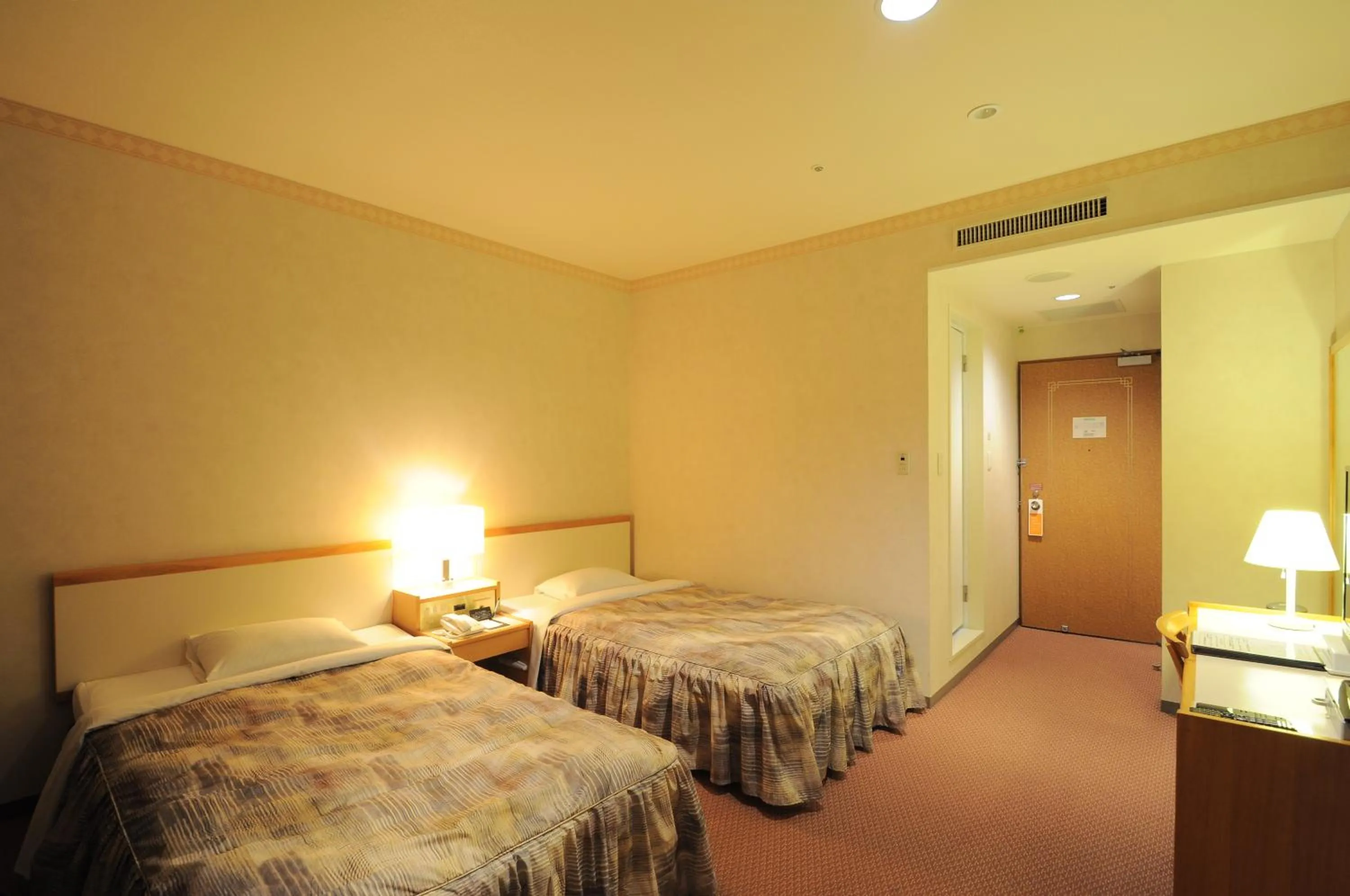 Photo of the whole room, Bed in Hotel Sapporo Sun Plaza