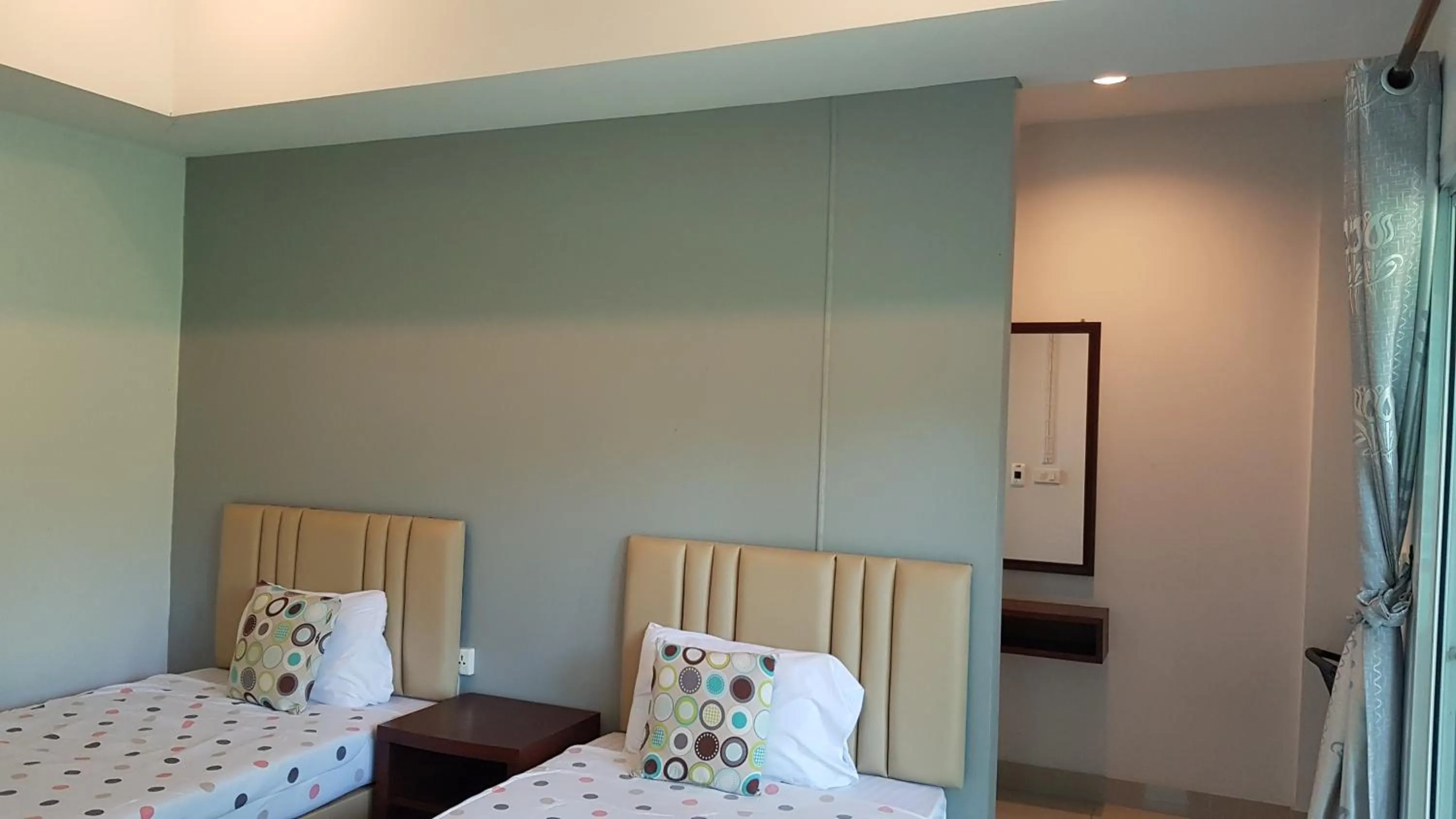 Bed in ที รีสอร์ท T Resort Suphanburi