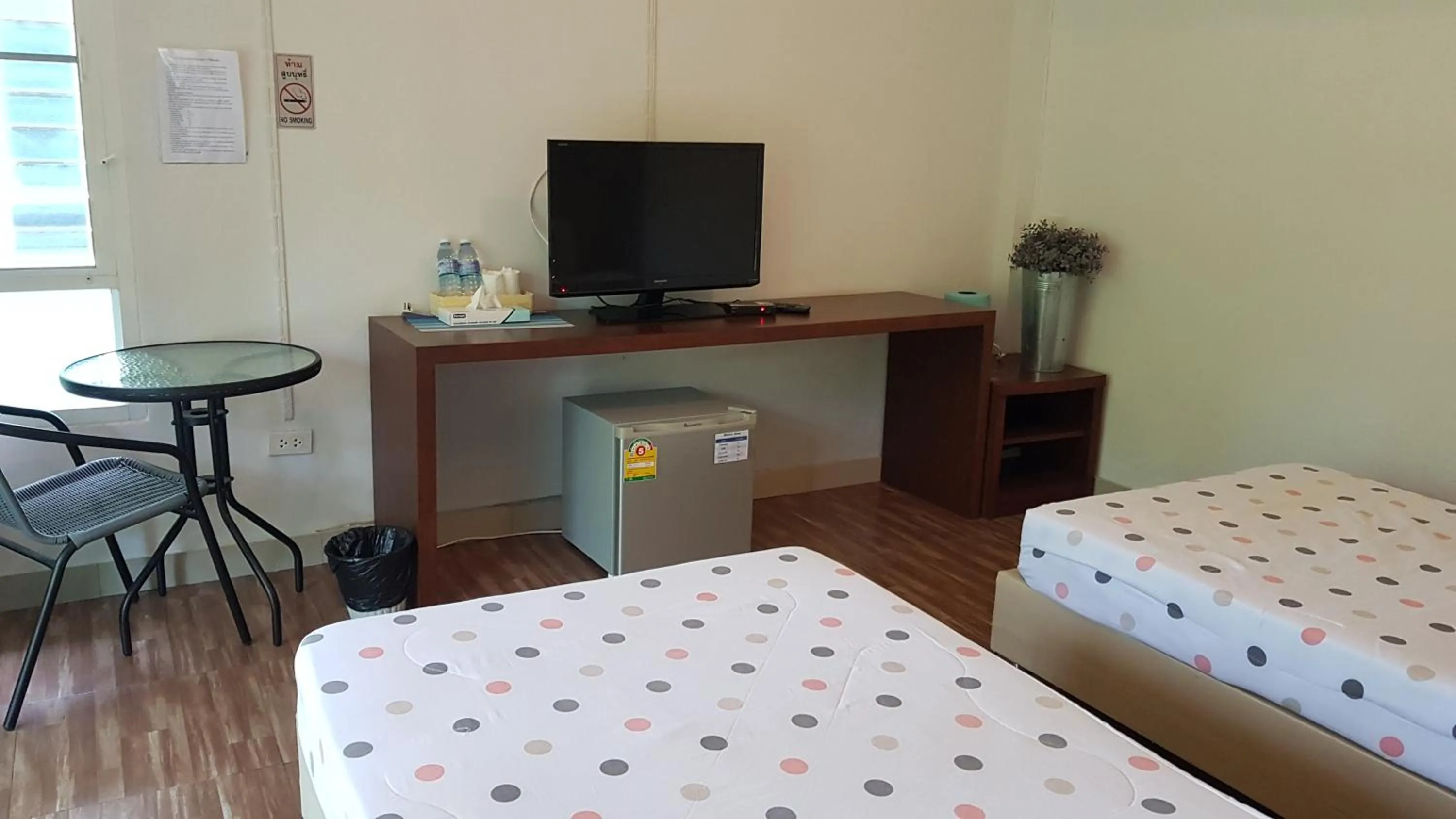 Bed in ที รีสอร์ท T Resort Suphanburi