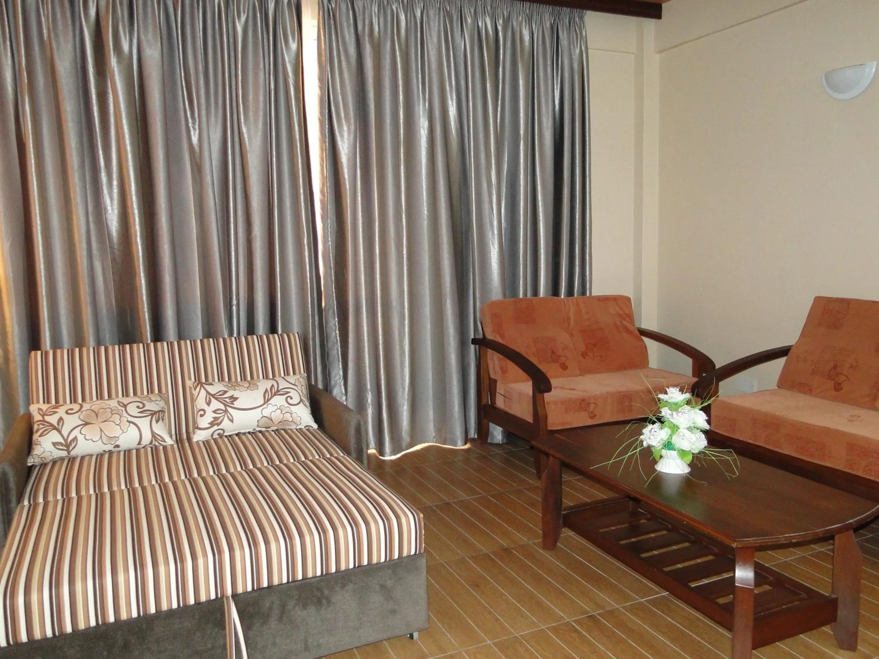 Seating area in Pavilion Holiday Resort