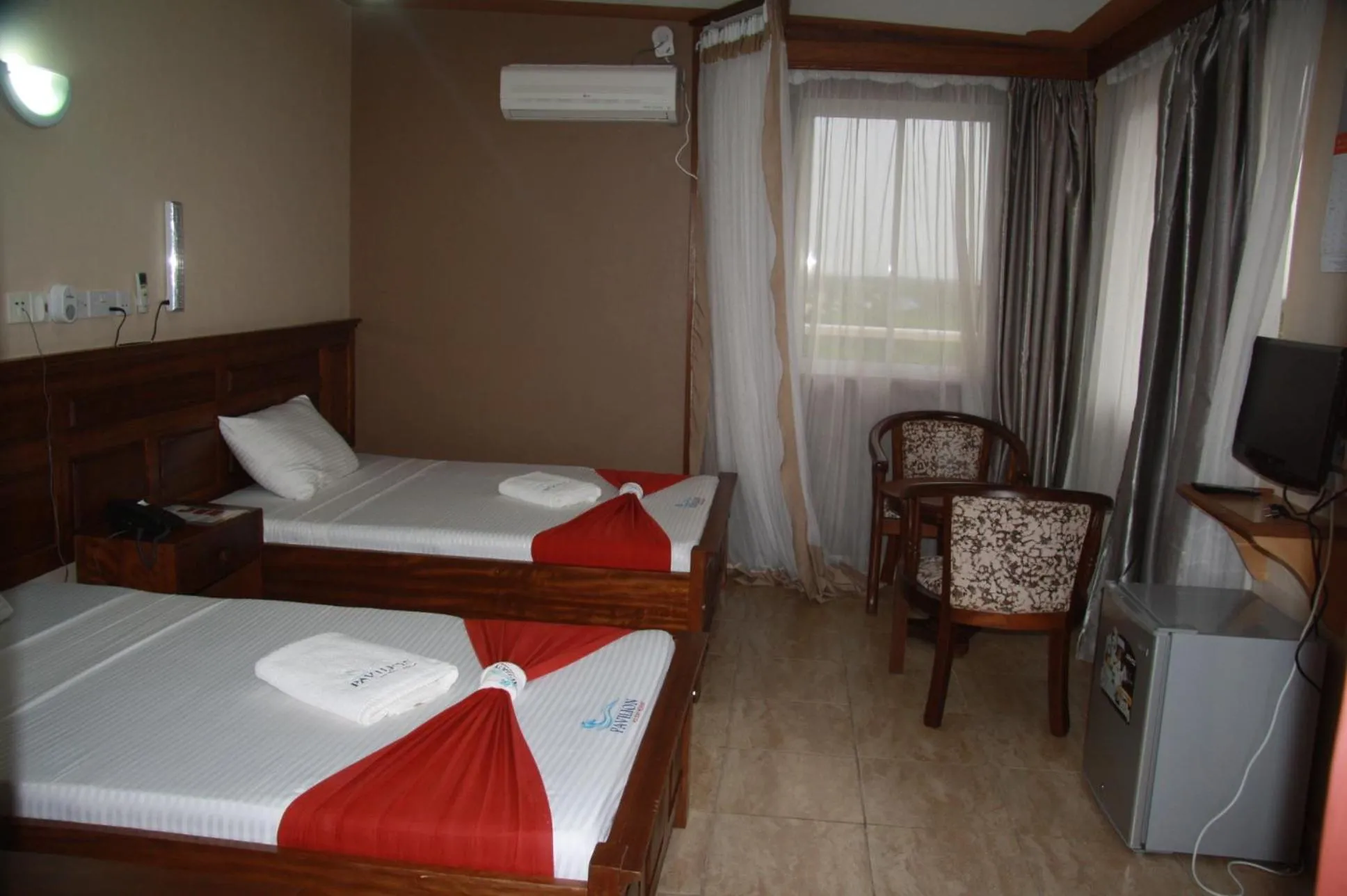 Photo of the whole room, Bed in Pavilion Holiday Resort