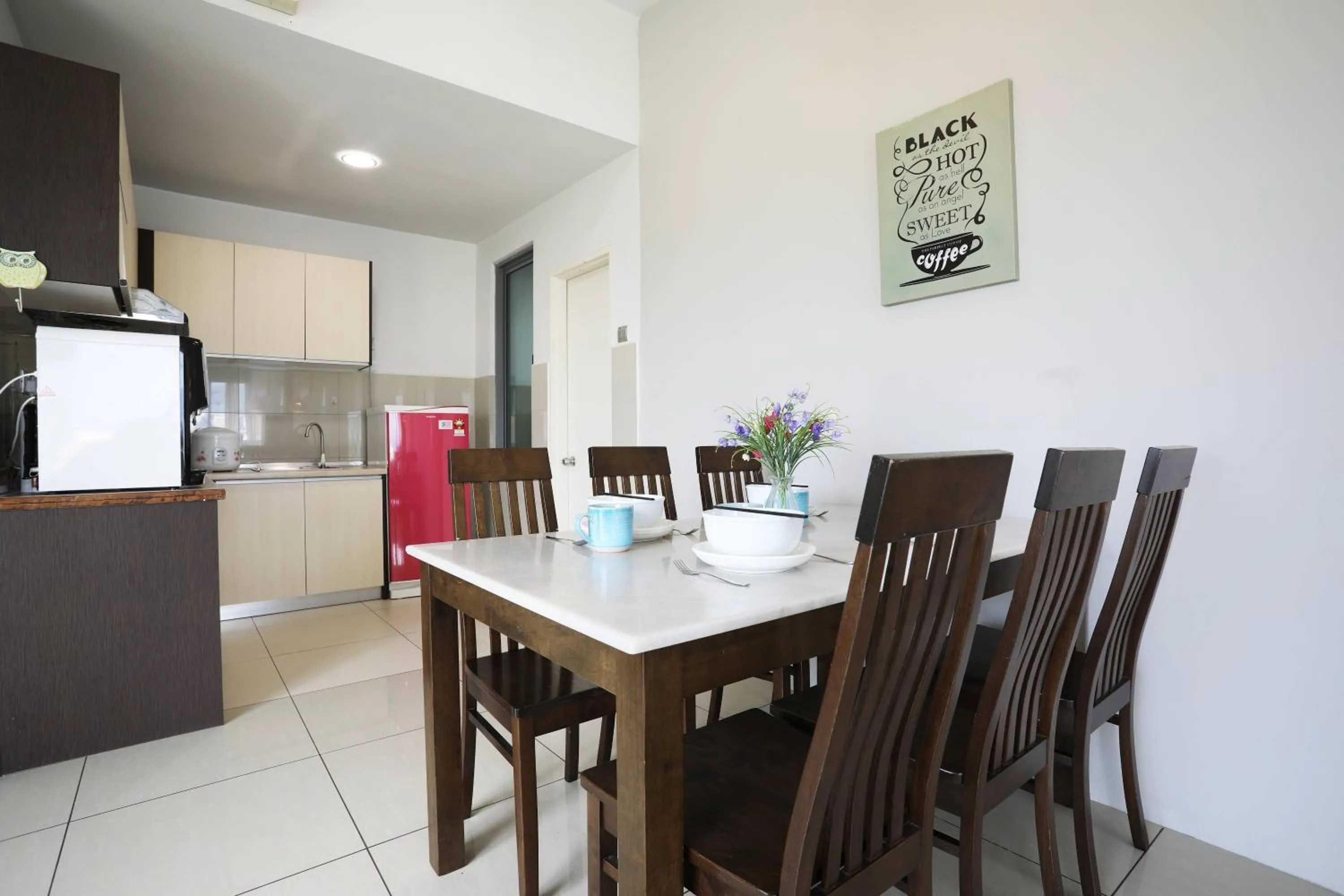Dining area in AJ Suites @ Loft Imago KK