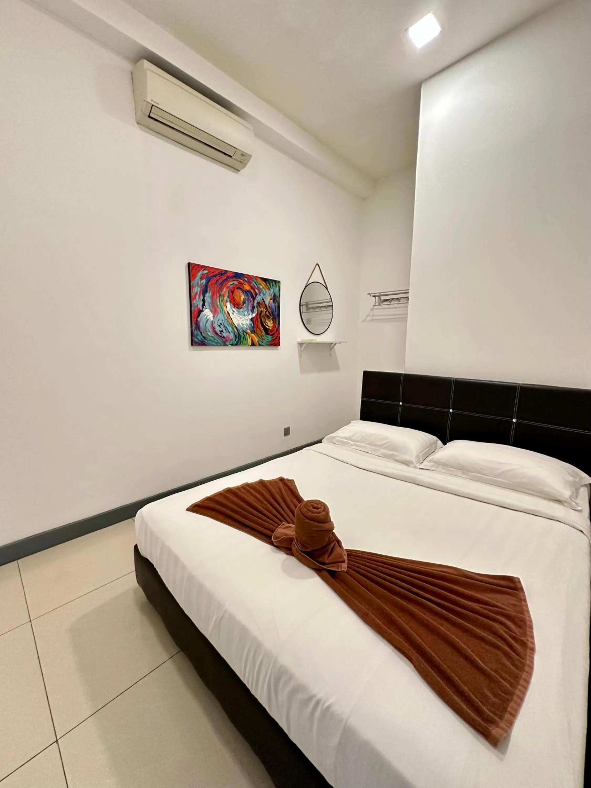 Bed in AJ Suites @ Loft Imago KK