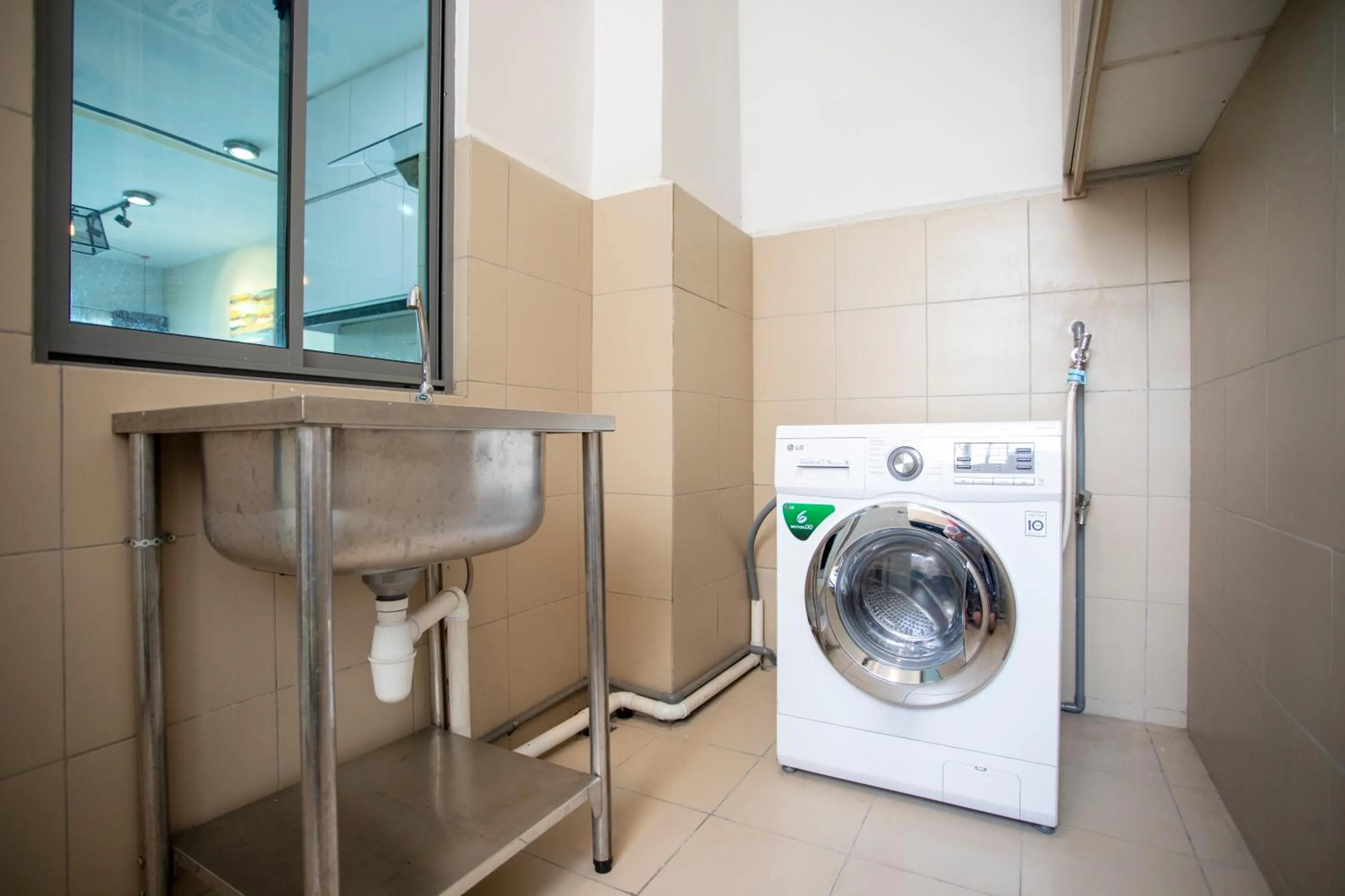 washing machine in AJ Suites @ Loft Imago KK