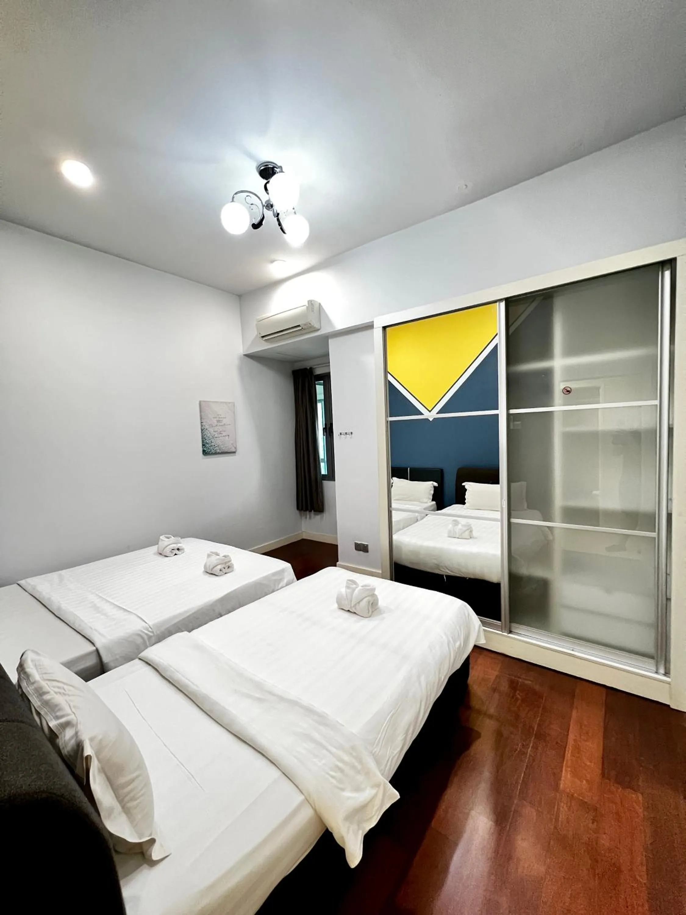 Bed in AJ Suites @ Loft Imago KK