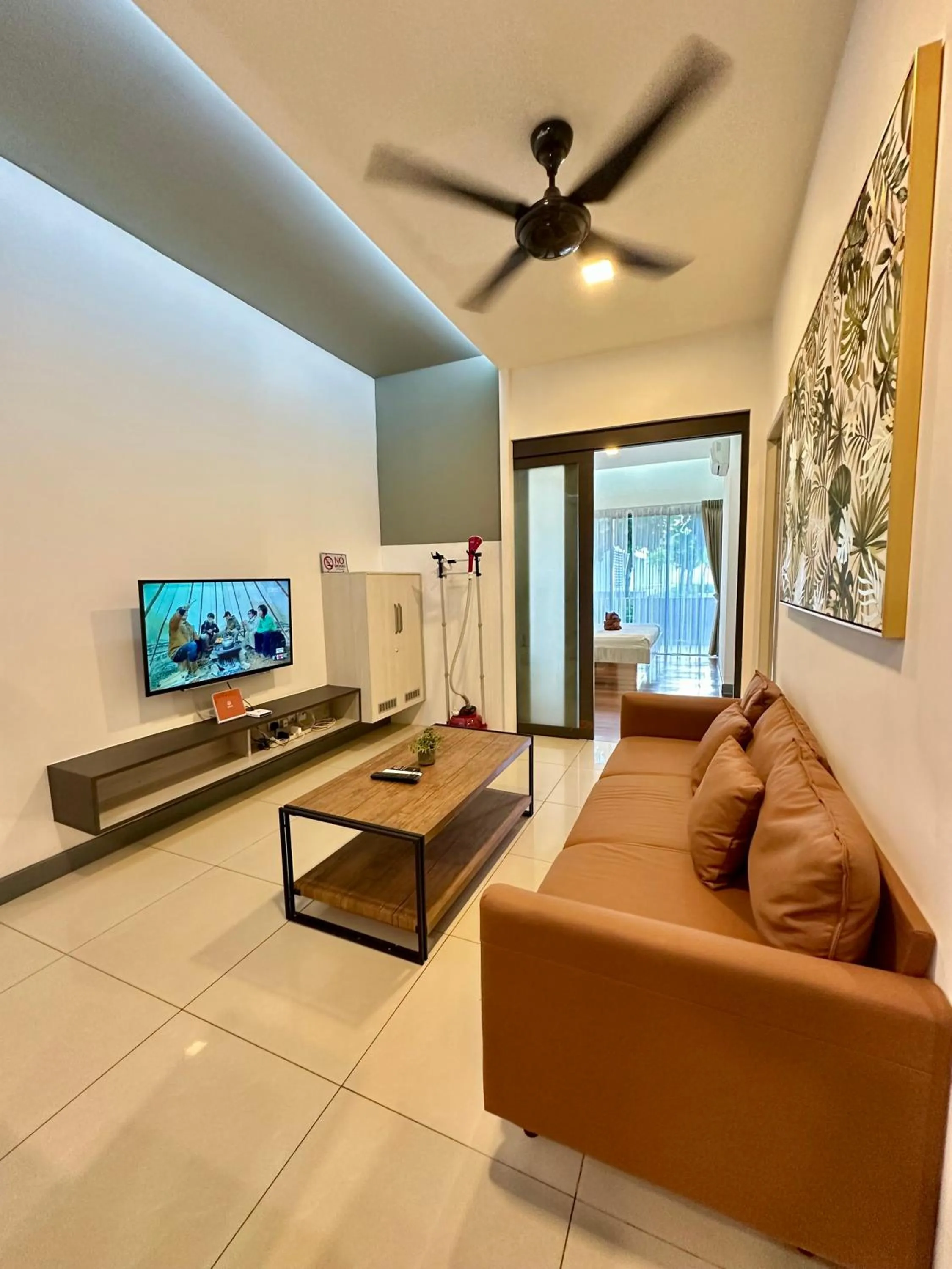 Communal lounge/ TV room in AJ Suites @ Loft Imago KK
