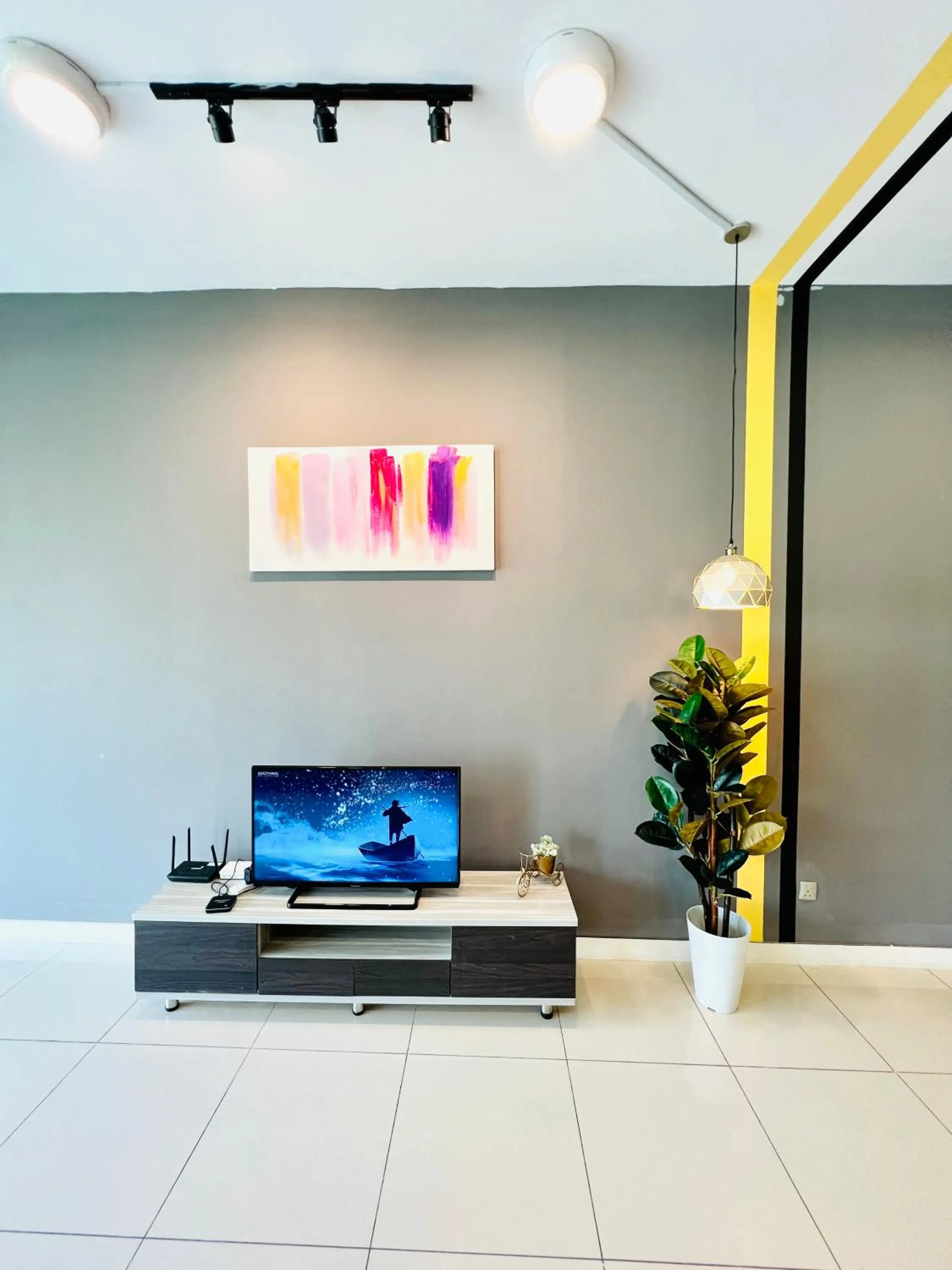 Communal lounge/ TV room in AJ Suites @ Loft Imago KK